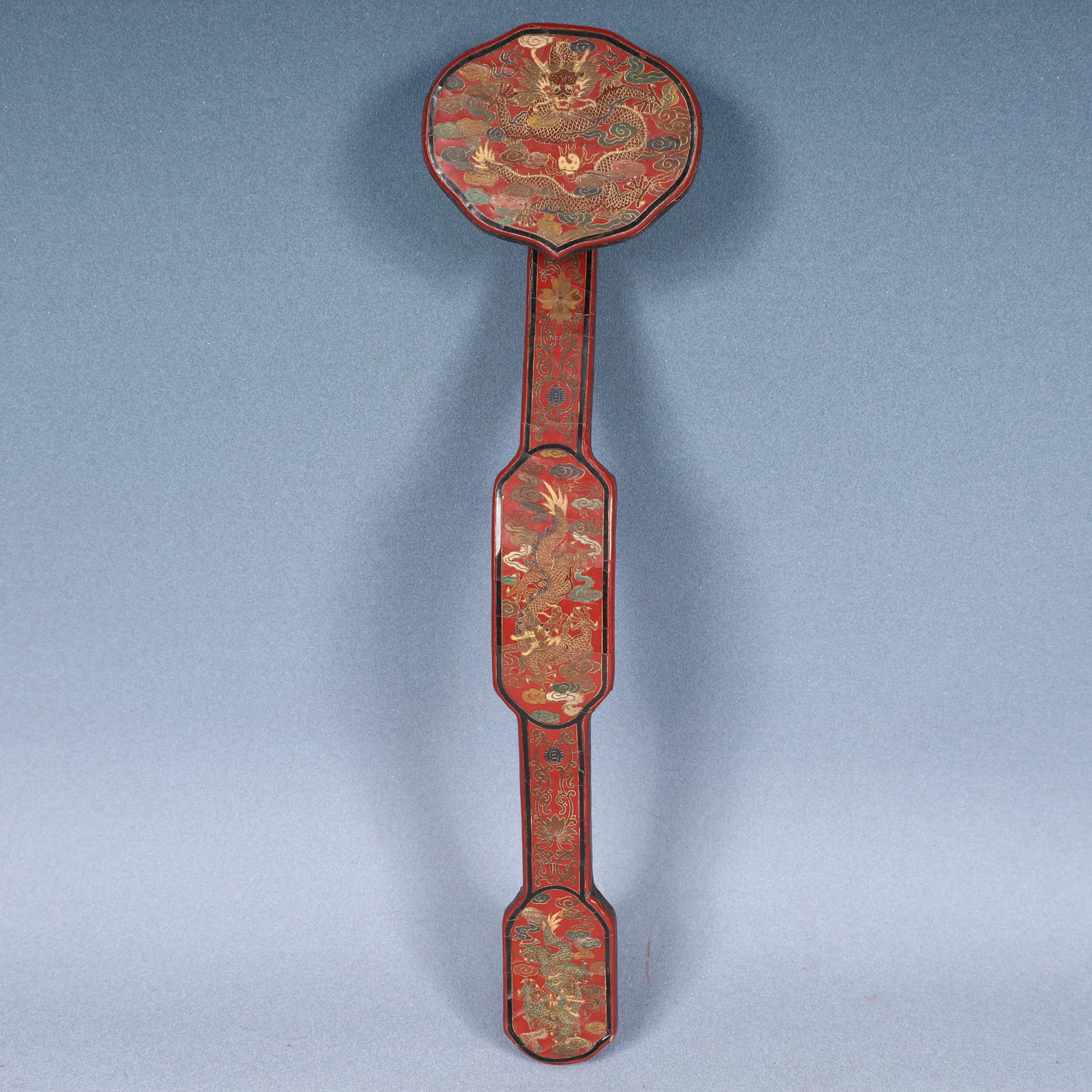 A Huge Carved Red Lacquer Painted Color Auspicious Cloud and Dragon Pattern Ruyi: A Huge Carved Red Lacquer Painted Color Auspicious Cloud and Dragon Pattern Ruyi,Qing Dynasty, China,Qianlong Six-character Mark,Size:16.1inx3.9inx2.4in,Weight:150g