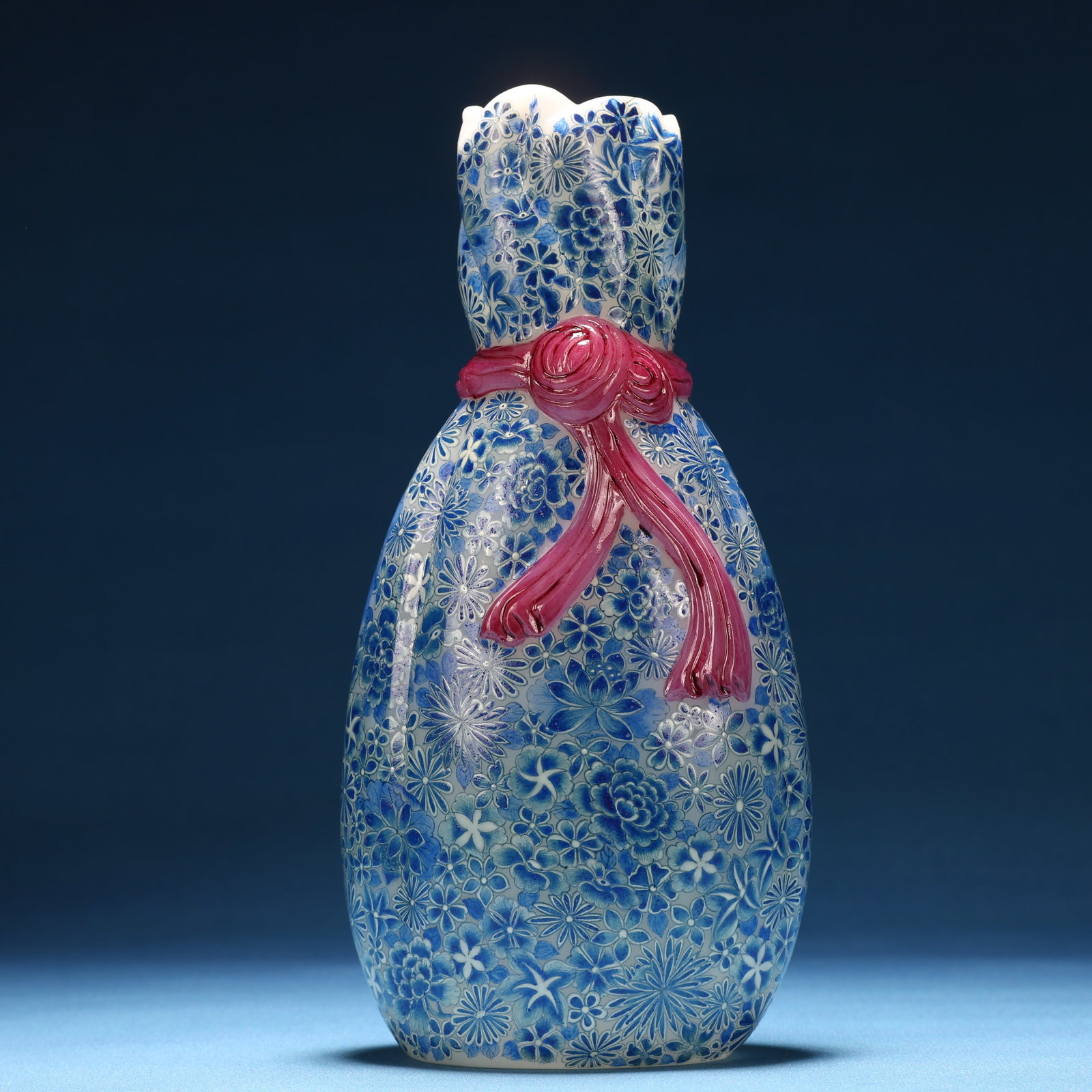A Fine Glass Painted Enamel Flower Pattern Vase: A Fine Glass Painted Enamel Flower Pattern Vase,Qing Dynasty, China,Qianlong Four-character Mark,Size:3.5inx2.2inx7.5in 料器画珐琅花卉纹瓶，
