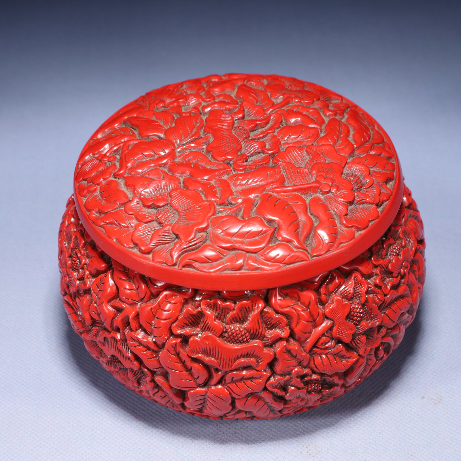 An Exquisite Carved Red Lacquer Flower Pattern Box with Cover: An Exquisite Carved Red Lacquer Flower Pattern Box with Cover,Qing Dynasty,China,With Mark,Size:5.1inx3.5in,Weight:650g 剔红漆花卉纹盖盒,中国