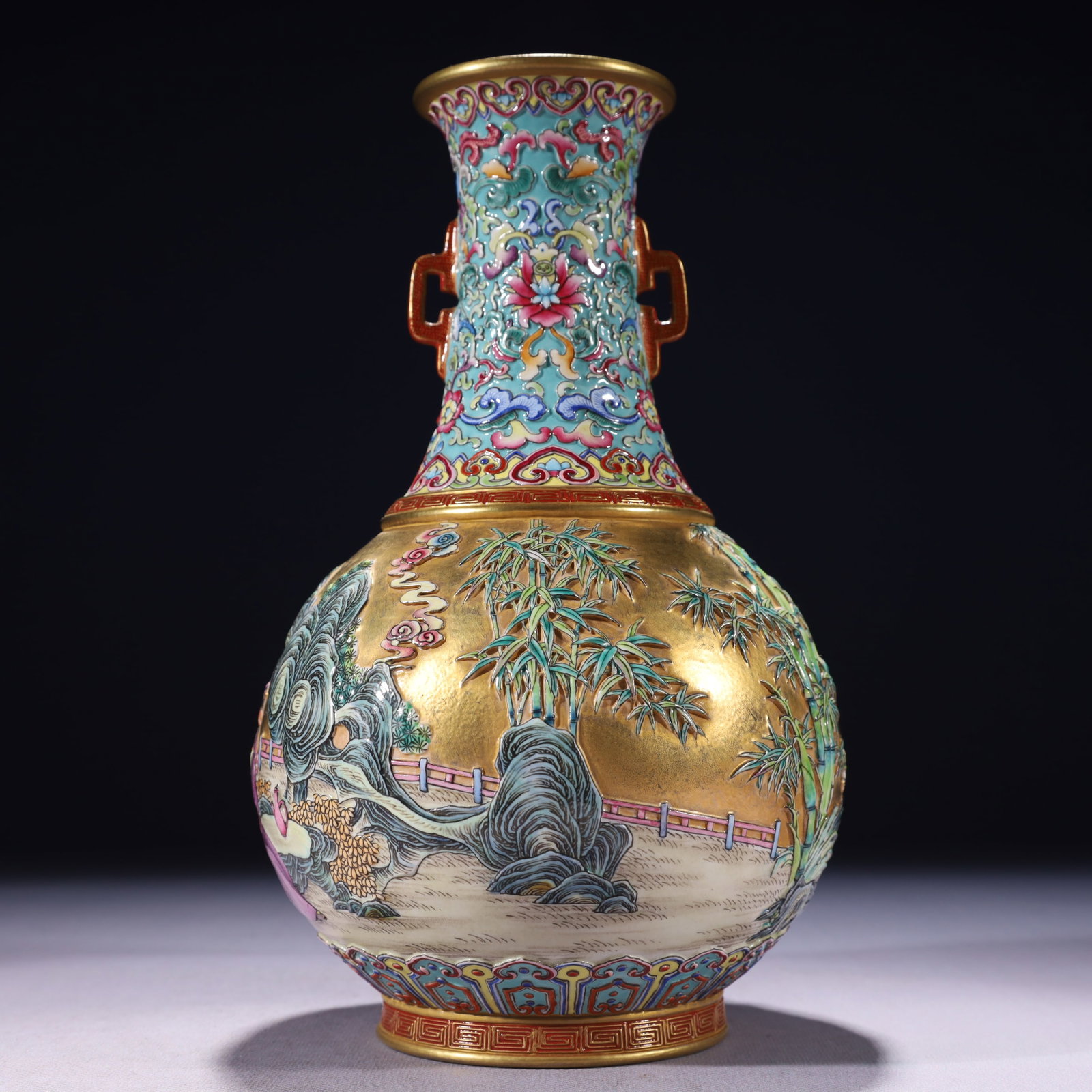 An Exquisite Famille-Rose Gold Ground Landscape and Figure Pattern Double-Ears Vase: An Exquisite Famille-Rose Gold Ground Landscape and Figure Pattern Double-Ears Vase,Qing Dynasty,China,Qianlong Six-character Mark,Size:5.9inx10.2in,Weight:1200g 粉彩金地ा