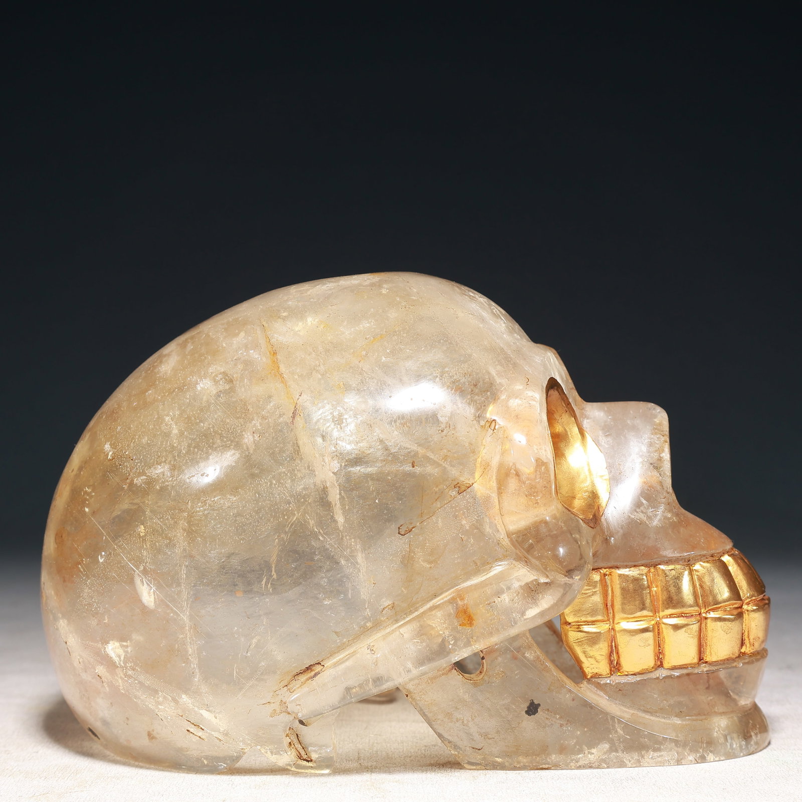 An Exquisite Crystal Cover with Gold Skull Ornament: An Exquisite Crystal Cover with Gold Skull Ornament,Qing Dynasty, China,Size:8.3inx5.1inx5.5in,Weight:1950g 水晶包金骷髅头摆件,中国