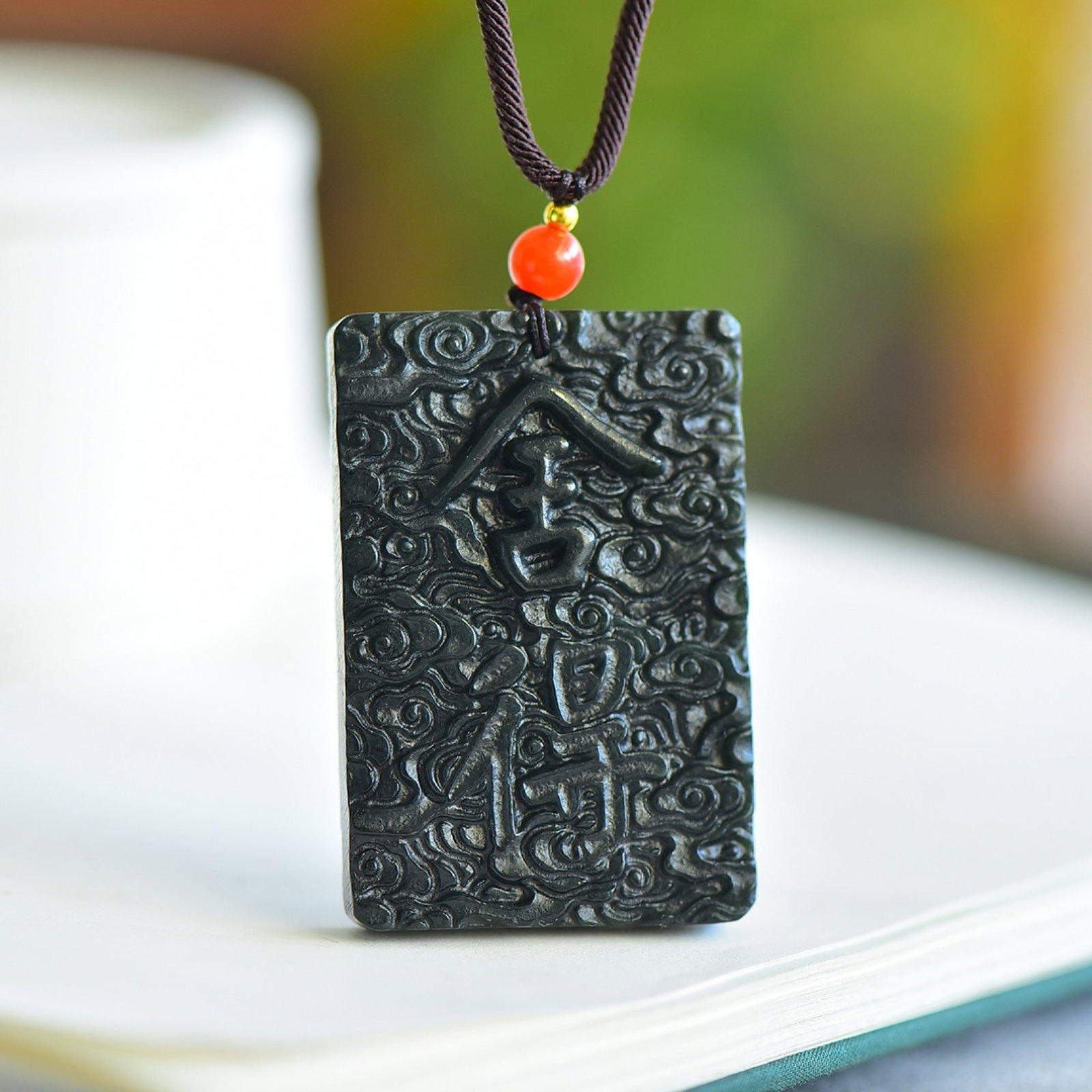 An Exquisite Sapphire Auspicious Cloud Pattern Pendant: An Exquisite Sapphire Auspicious Cloud Pattern Pendant,Size:38mmx56mm 青玉祥云纹吊坠