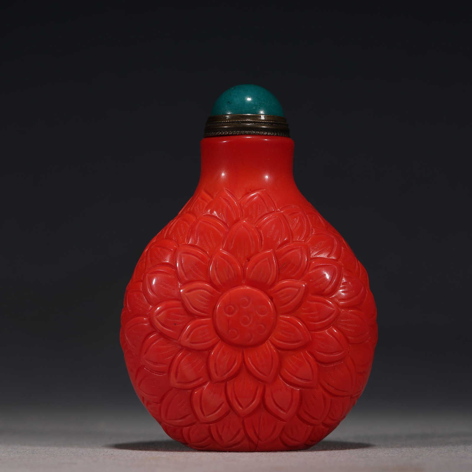 An Exquisite Coral Red Glass Lotus Pond Pattern Snuff Bottle: An Exquisite Coral Red Glass Lotus Pond Pattern Snuff Bottle,Qing Dynasty, China,Yongzheng Four-character Mark,Size:2.2in×1.2in×3.1in