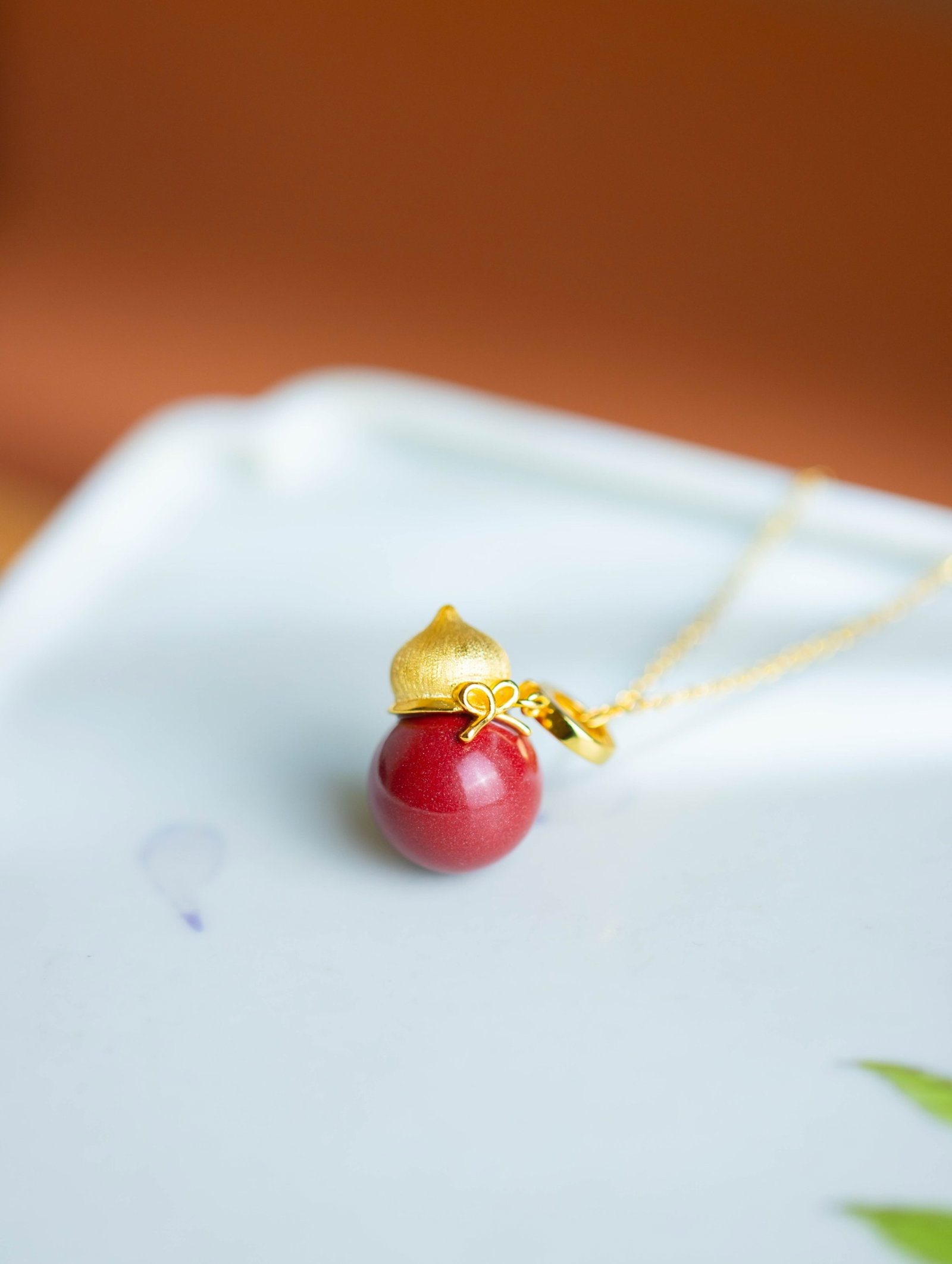 An Exquisite Sterling Silver-Gold Plated Inlaid Cinnabar Gourd Pendant: An Exquisite Sterling Silver-Gold Plated Inlaid Cinnabar Gourd Pendant 纯银镀金镶朱砂葫芦吊坠