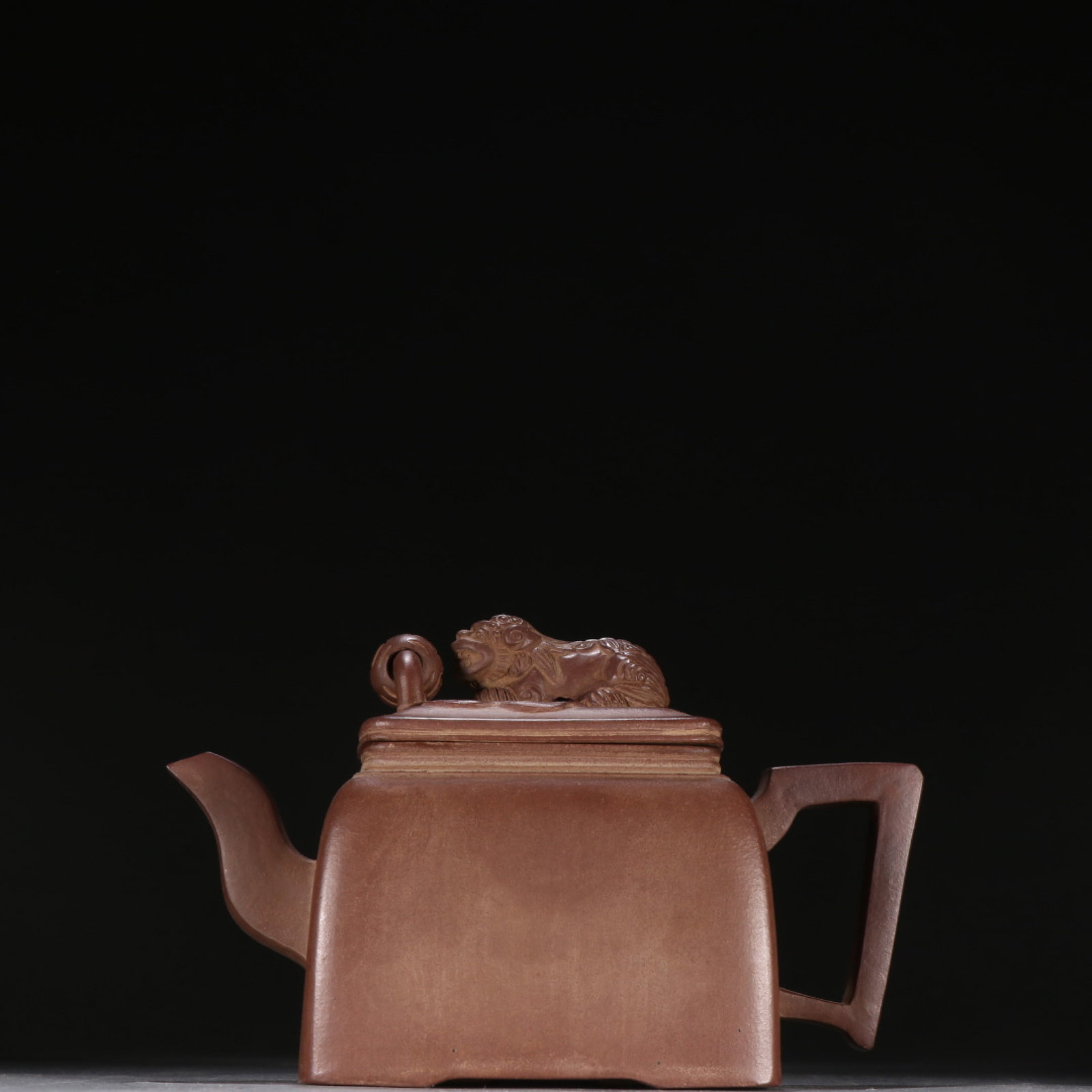 A Rare Purple Sands Lion Pattern Teapot: A Rare Purple Sands Lion Pattern Teapot,Qing Dynasty,China,Shilin Zhongren Mark,Size:7.8inx7in 紫砂狮子纹茶壶,中国清代,石林