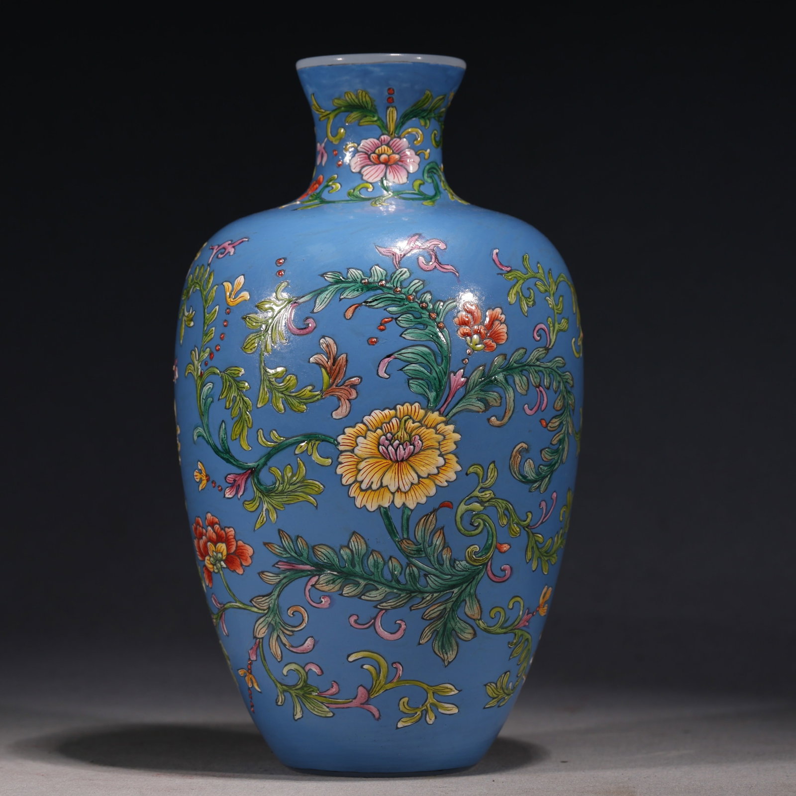 An Exquisite Blue Ground Glass Body Enamel Meiping Vase With Interlocking Peony Pattern: An Exquisite Blue Ground Glass Body Enamel Meiping Vase With Interlocking Peony Pattern，China, Qing Dynasty, Four-Character Qianlong Mark, Dimensions: 4.3inx4.3inx7.9in, Weight: 600g，