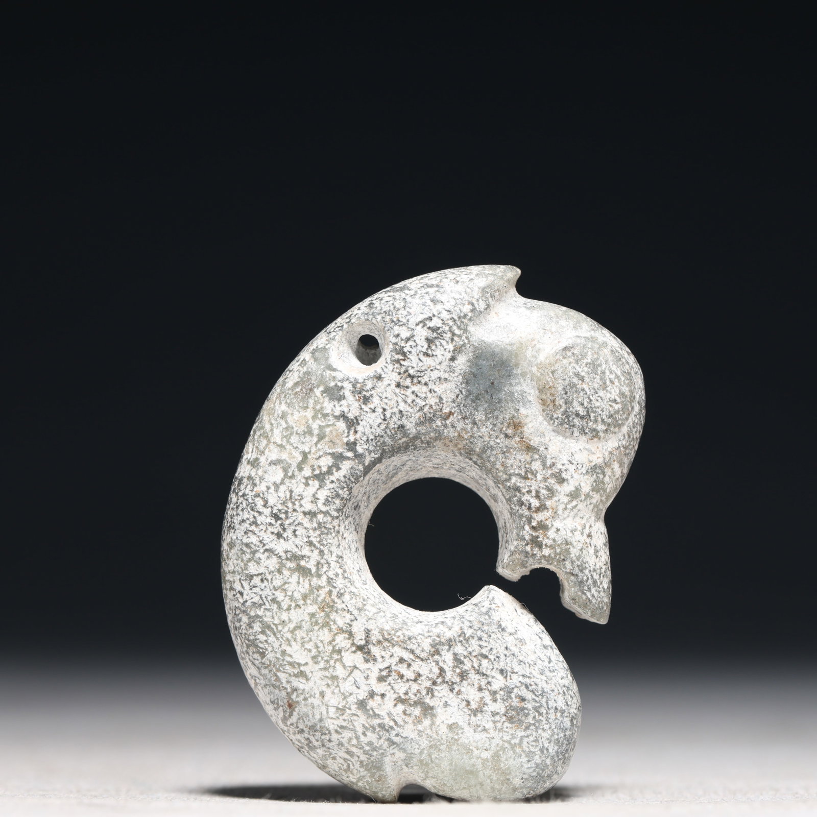An Archaic Hongshan Culture Cyan jade Pig and Dragon Pendant: An Archaic Hongshan Culture Cyan jade Pig and Dragon Pendant,Ancient Time, China,Size:1.5inx2in Weight:40g 红山文化青玉猪龙挂件,新