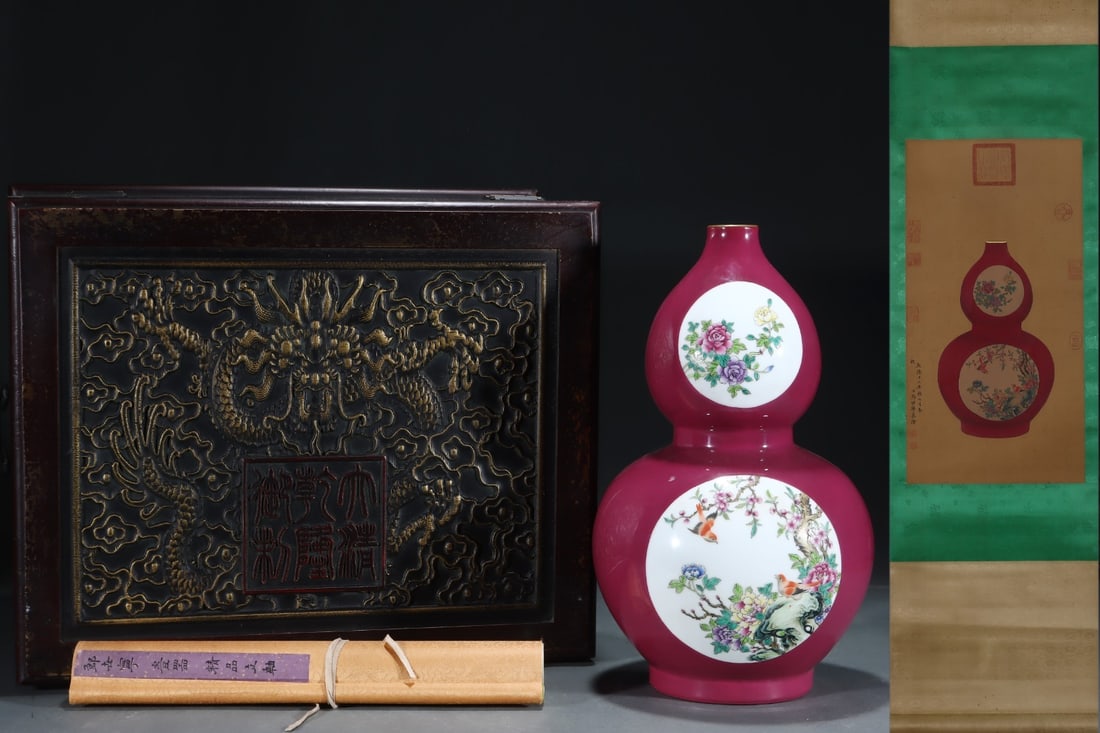 A Rare Red-glazed with famille rose reserved panels double-gourd vase decorated with birds and: A Rare Red-glazed with famille rose reserved panels double-gourd vase decorated with birds and flowers, gilt decoration, with a silk painting hanging scroll,Qing Dynasty, China, Qianlong Six-character