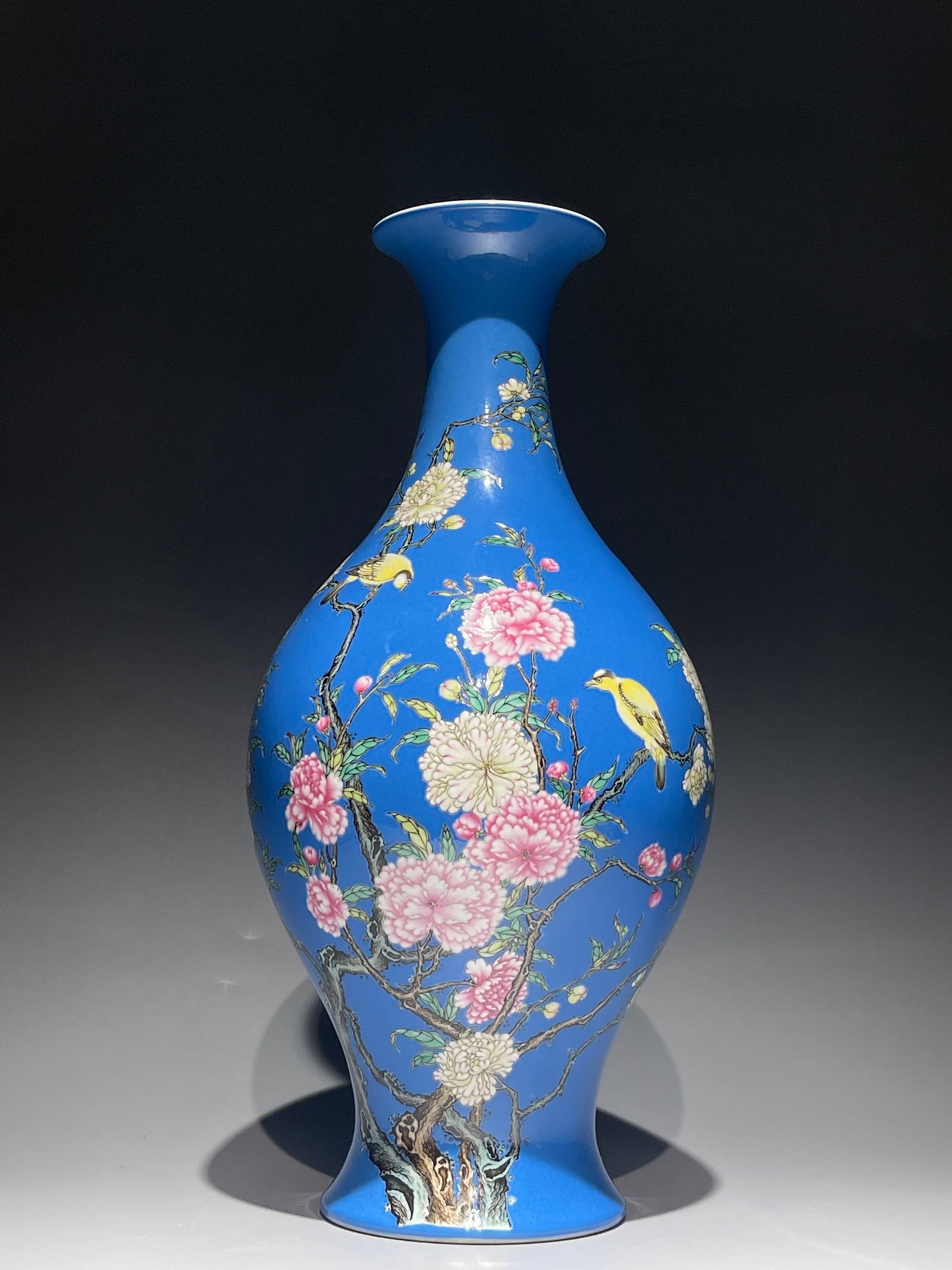A Rare Blue Ground Famille-Rose Flower and Bird Pattern Vase: A Rare Blue Ground Famille-Rose Flower and Bird Pattern Vase,Qing Dynasty,China,Yongzheng Six-character Mark,Size:14.2inx7.1in 蓝地粉彩花鸟纹瓶,中