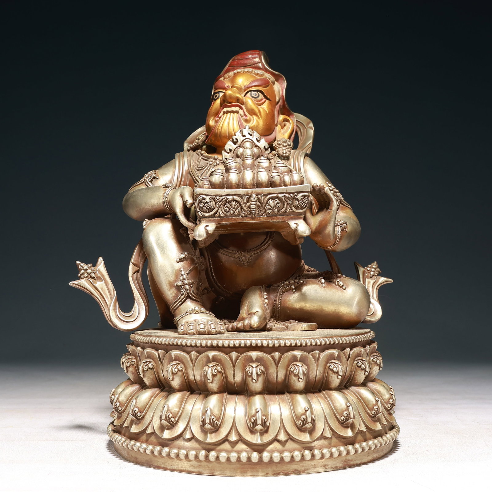 A Solemn Silver-Gilt Bronze Statue of Mammon: A Solemn Silver-Gilt Bronze Statue of Mammon,Ming Dynasty, China,Yongle Six-character Mark,Size:9.4inx7.1inx12.6in,Weight:6950g 铜鎏金鎏银财神像,中