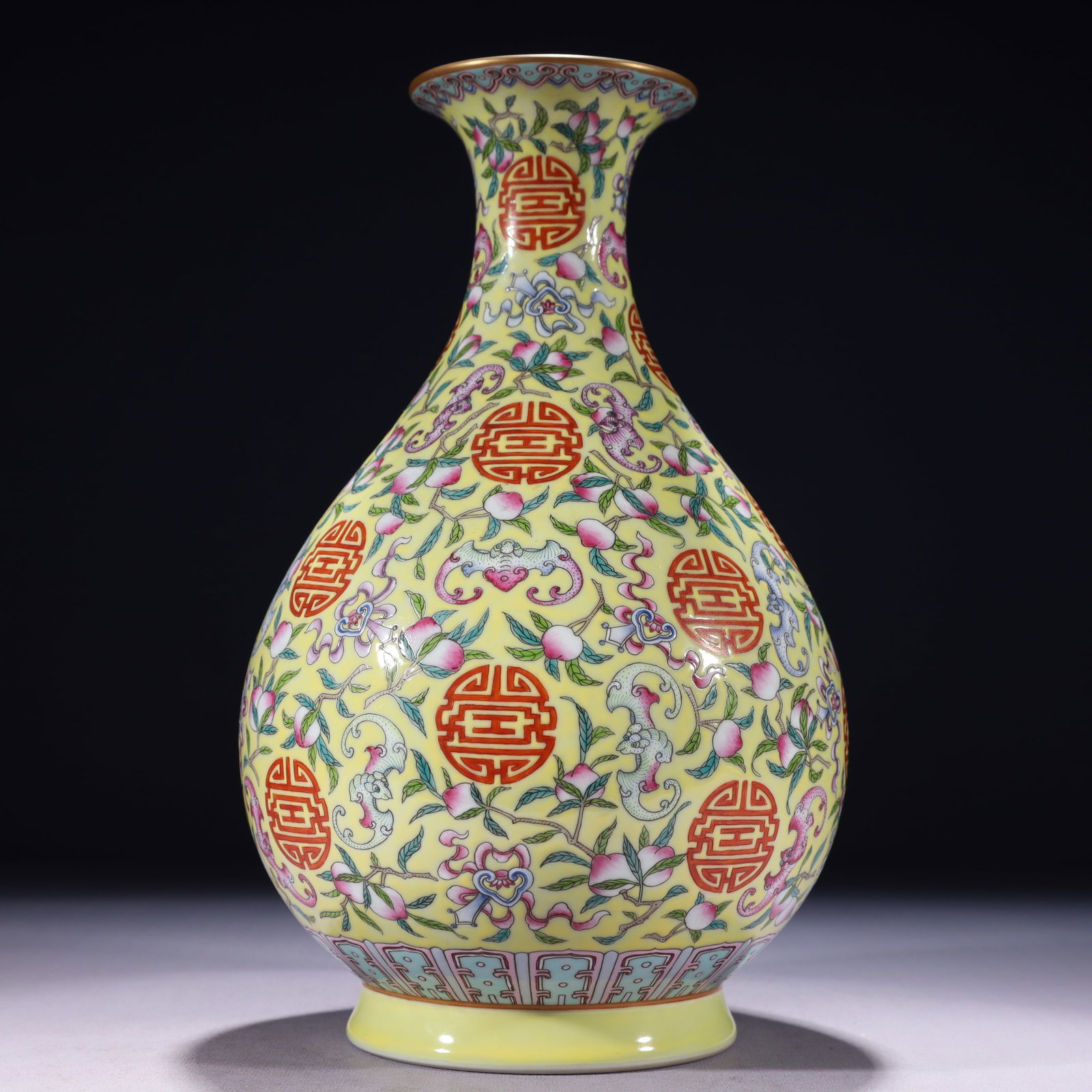 An Exquisite Yellow Ground Famille-Rose Painted Gold Bats and Peach Pattern Vase: An Exquisite Yellow Ground Famille-Rose Painted Gold Bats and Peach Pattern Vase,Qing Dynasty,China,Jiaqing Six-character Mark,Size:6.7inx12.2in,Weight:2100g 黄地粉彩描&#