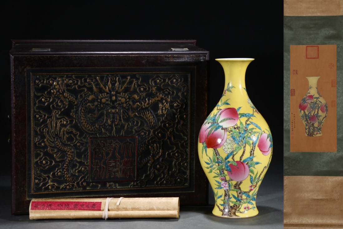 A Rare Yellow-ground famille rose Guanyin vase decorated with peaches of immortality, with a silk: A Rare Yellow-ground famille rose Guanyin vase decorated with peaches of immortality, with a silk painting hanging scroll,Qing Dynasty, China, Yongzheng Six-character Mark,Size:15.6inx7.2in,(Without f