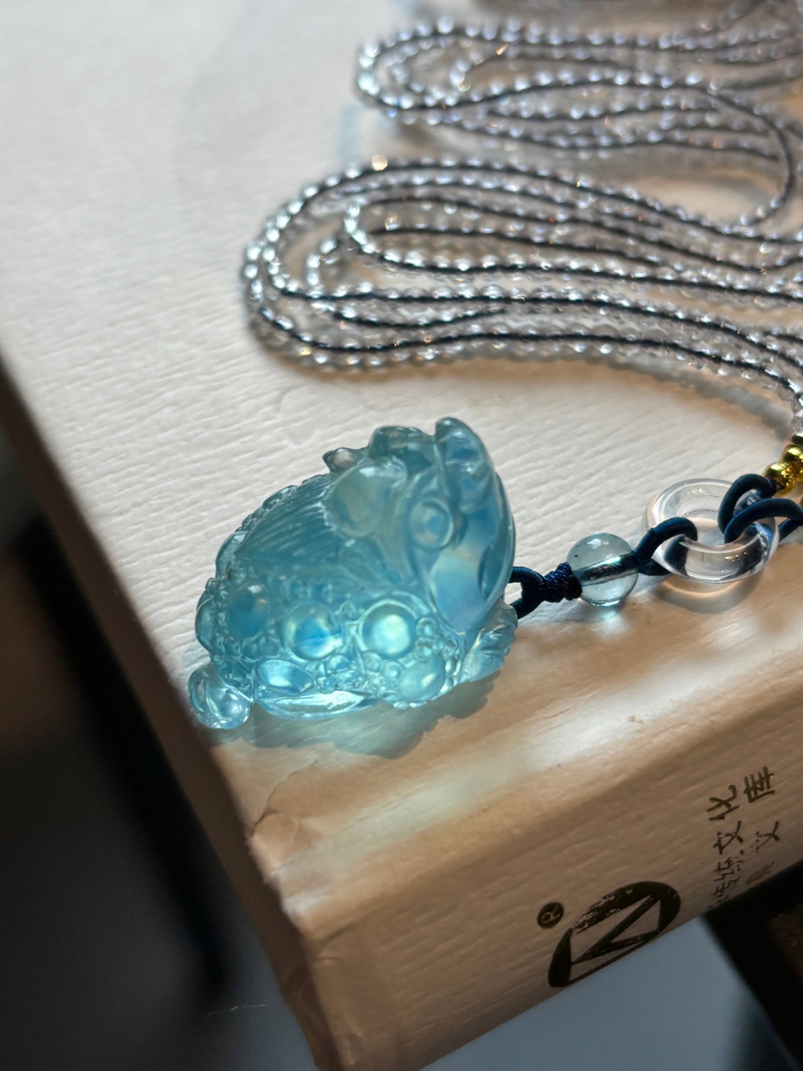 An Exquisite Aquamarine Auspicious Beast Pendant: An Exquisite Aquamarine Auspicious Beast Pendant,Size:26mmx18mmx16mm,Total Weight:14.3g 海蓝宝瑞兽吊坠