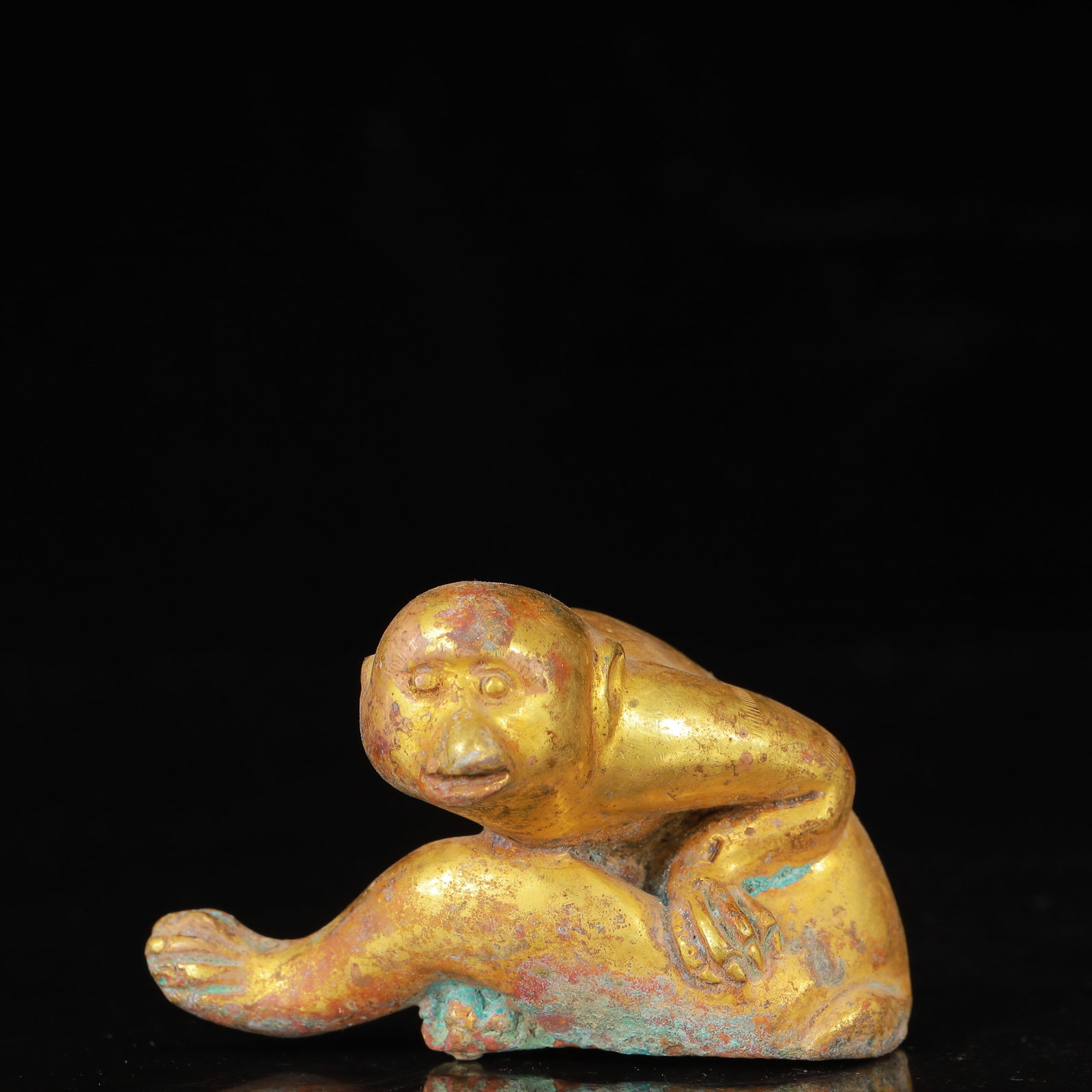 An Exquisite Gilt Bronze Monkey Ornament: An Exquisite Gilt Bronze Monkey Ornament,Qing Dynasty,China,Size:3.1inx1.6inx2in,Weight:162g 铜鎏金猴子摆件,中国清代
