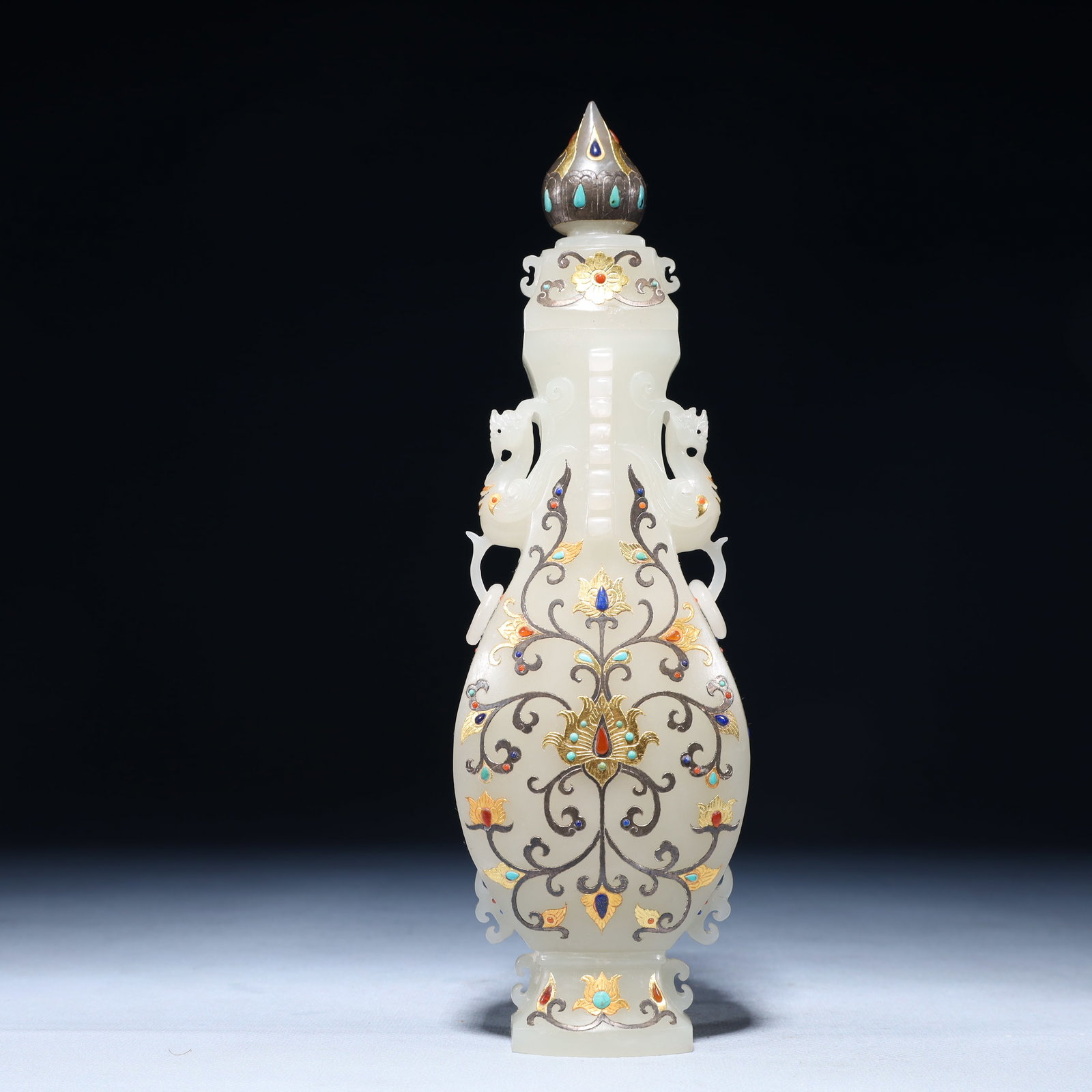 An Exquisite White Jade Inlaid Gilt Bronze Flower Pattern Double-Ears Vase: An Exquisite White Jade Inlaid Gilt Bronze Flower Pattern Double-Ears Vase, Qing Dynasty,China, Size:2.8inx1.2inx9.4in,Weight:550g 白玉嵌铜鎏金花卉ń