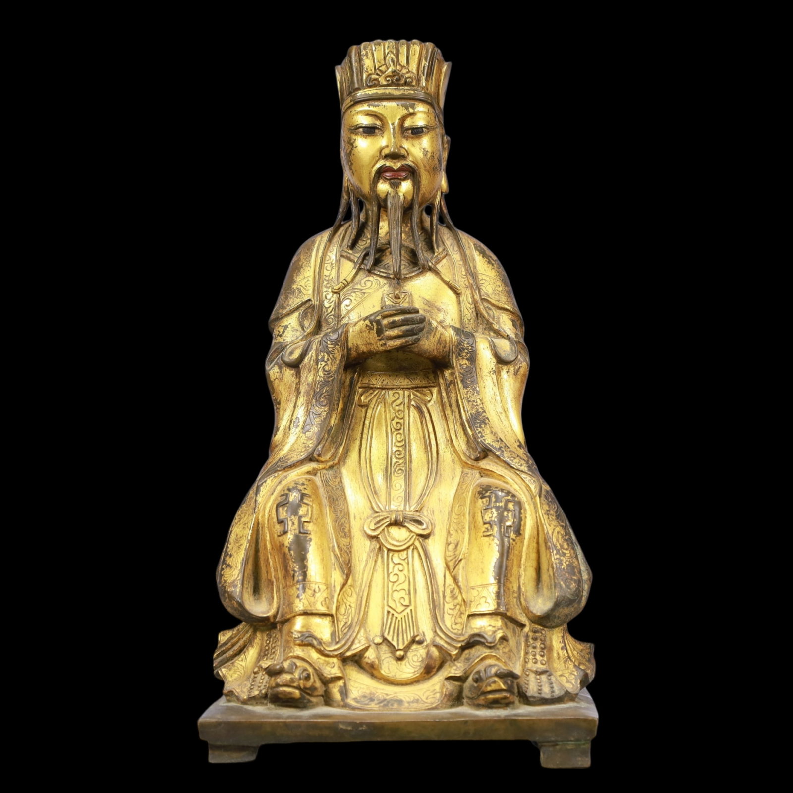 A Solemn Gilt Bronze Statue of Figure: A Solemn Gilt Bronze Statue of Figure,Ming Dynasty, China,Size:5.7inx5.1inx10.6inWeigh:3500g 铜鎏金人物像,中国明代