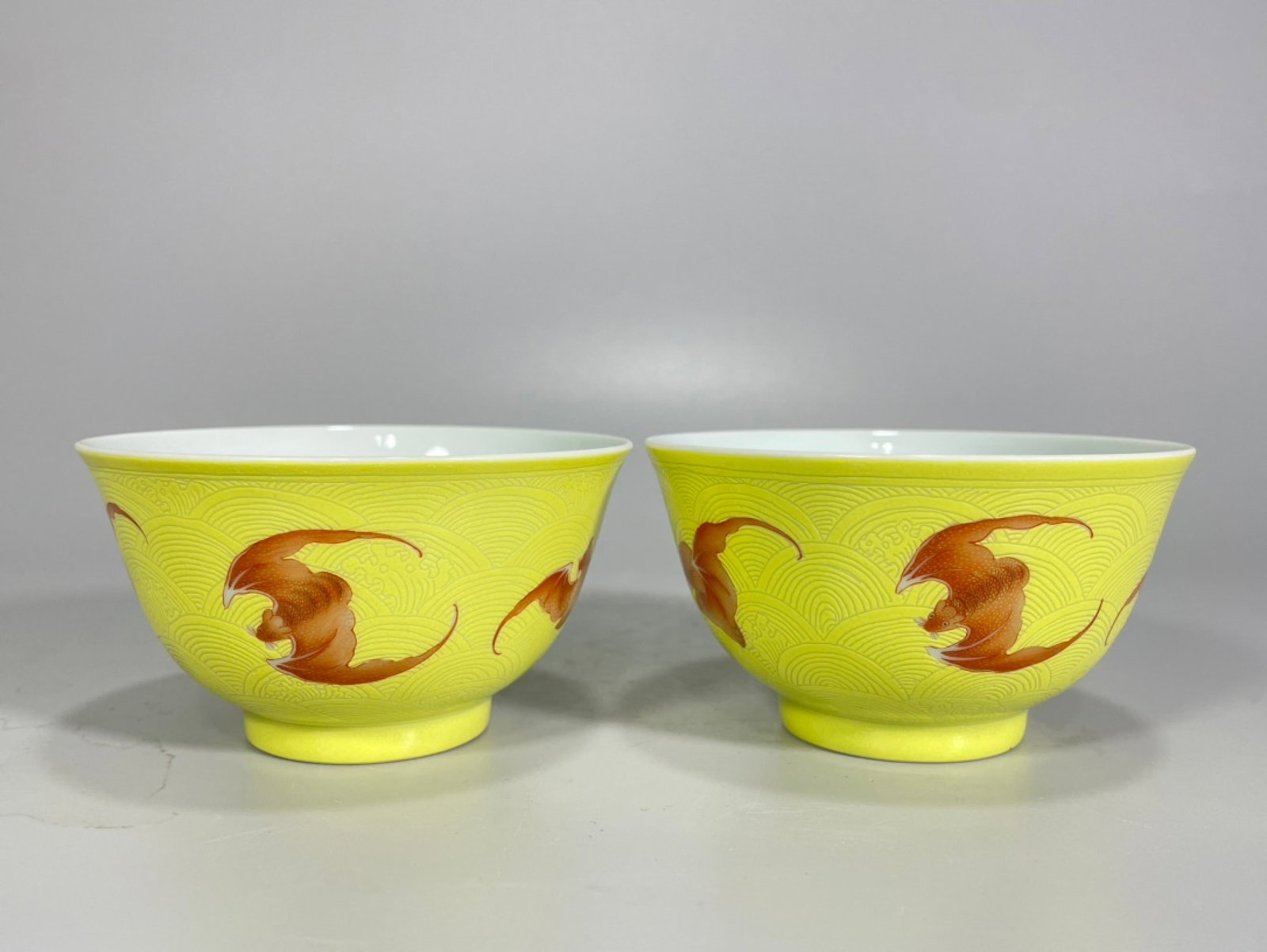 A Pair of Exquisite Yellow Glazed Painted Gold Bats Pattern Cups: A Pair of Exquisite Yellow Glazed Painted Gold Bats Pattern Cups,Qing Dynasty,China,Yongzheng Six-character Mark,Size:2inx3.5in 一对黄釉描金蝙蝠纹