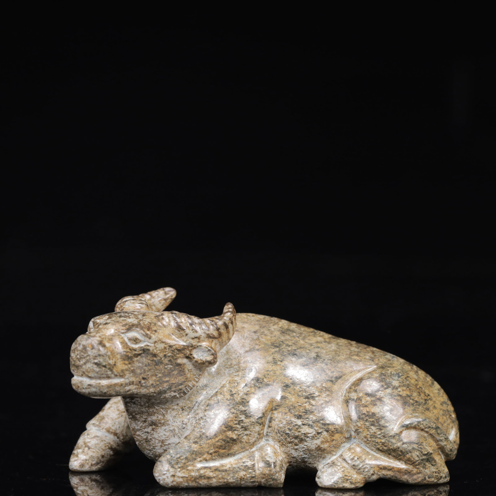 An Exquisite Greenish Jade Buffalo Ornament: An Exquisite Greenish Jade Buffalo Ornament,Qing Dynasty,China,Size:3.1inx1.6inx1.4in,Weight:168g 青白玉牛摆件,中国清代