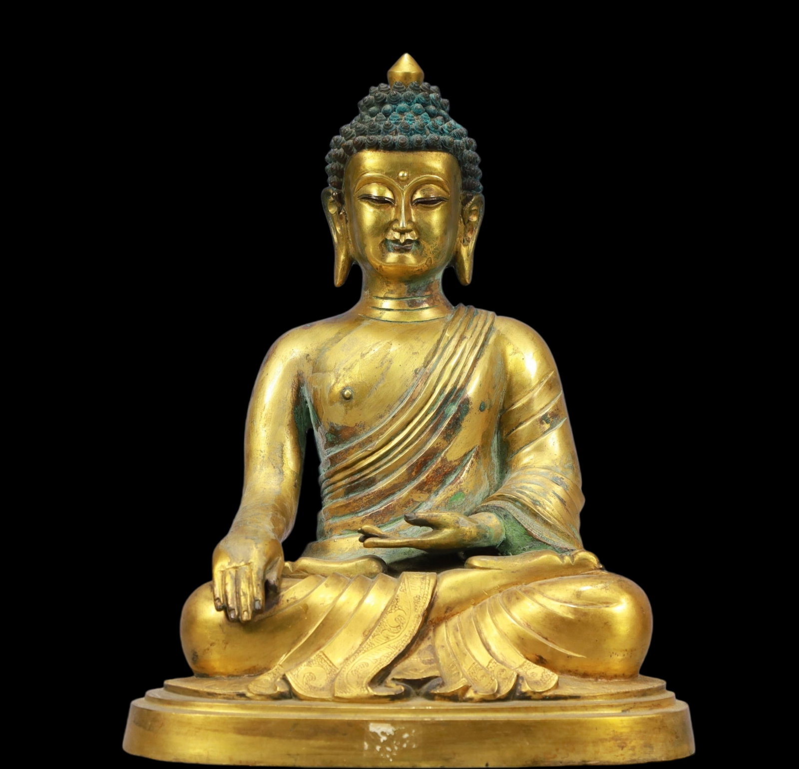 A Solemn Gilt Bronze Statue of Sakyamuni: A Solemn Gilt Bronze Statue of Sakyamuni,Ming Dynasty, China,Yong Le Six-character Mark,Size:8.9inx6.7inx11.4inWeigh:5600g 铜鎏金释迦牟尼像,中