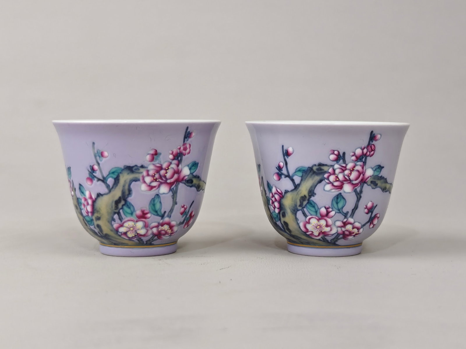 A Pair of Exquisite Famille-Rose Flower Pattern Cups: A Pair of Exquisite Famille-Rose Flower Pattern Cups,Qing Dynasty,China,Yongzheng Six-character Mark,Size:2inx2.4in 一对粉彩花卉纹杯子,中