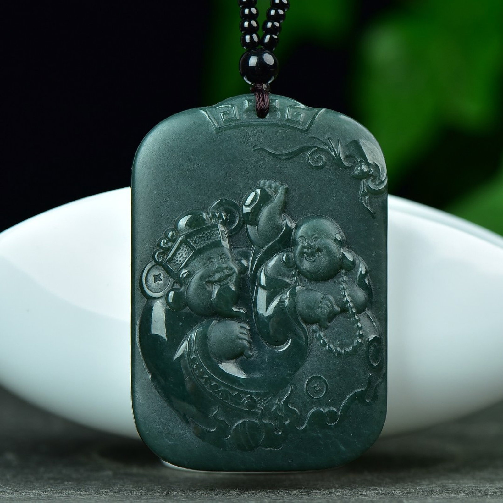 An Exquisite Sapphire Buddha Pattern Pendant: An Exquisite Sapphire Buddha Pattern Pendant,Size:42mmx62mm (寓意)做工细腻,玉质干净 青玉佛像纹吊坠