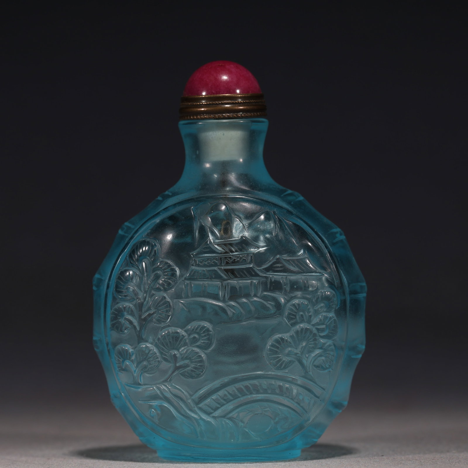 An Exquisite Sky-blue Glass Landscape Pavilion Pattern Snuff Bottle: An Exquisite Sky-blue Glass Landscape Pavilion Pattern Snuff Bottle,Qing Dynasty, China,Qianlong Four-character Mark,Size:2.2in×1.2in×3.1in 天蓝琉璃山水&#