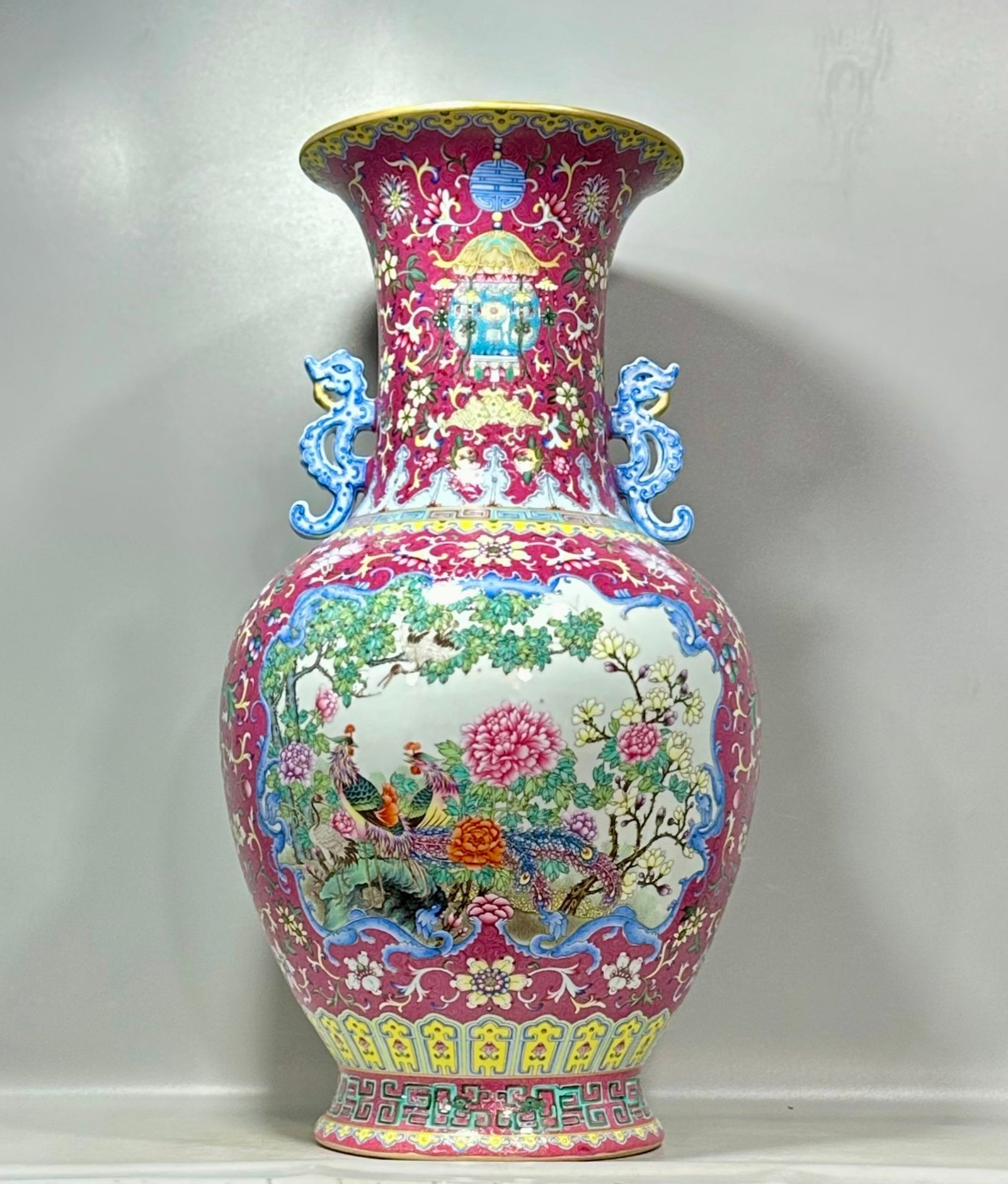 A Solemn Gilt Bronze Statue of Avalokitesvara,Inlaid Turquoise: A Huge Enamel Ruby Red-Glazed Flower and Phoenix Pattern Double-Ears Vase,Qing Dynasty,China,Qianlong Six-character Mark,Size:23.4inx12.8in