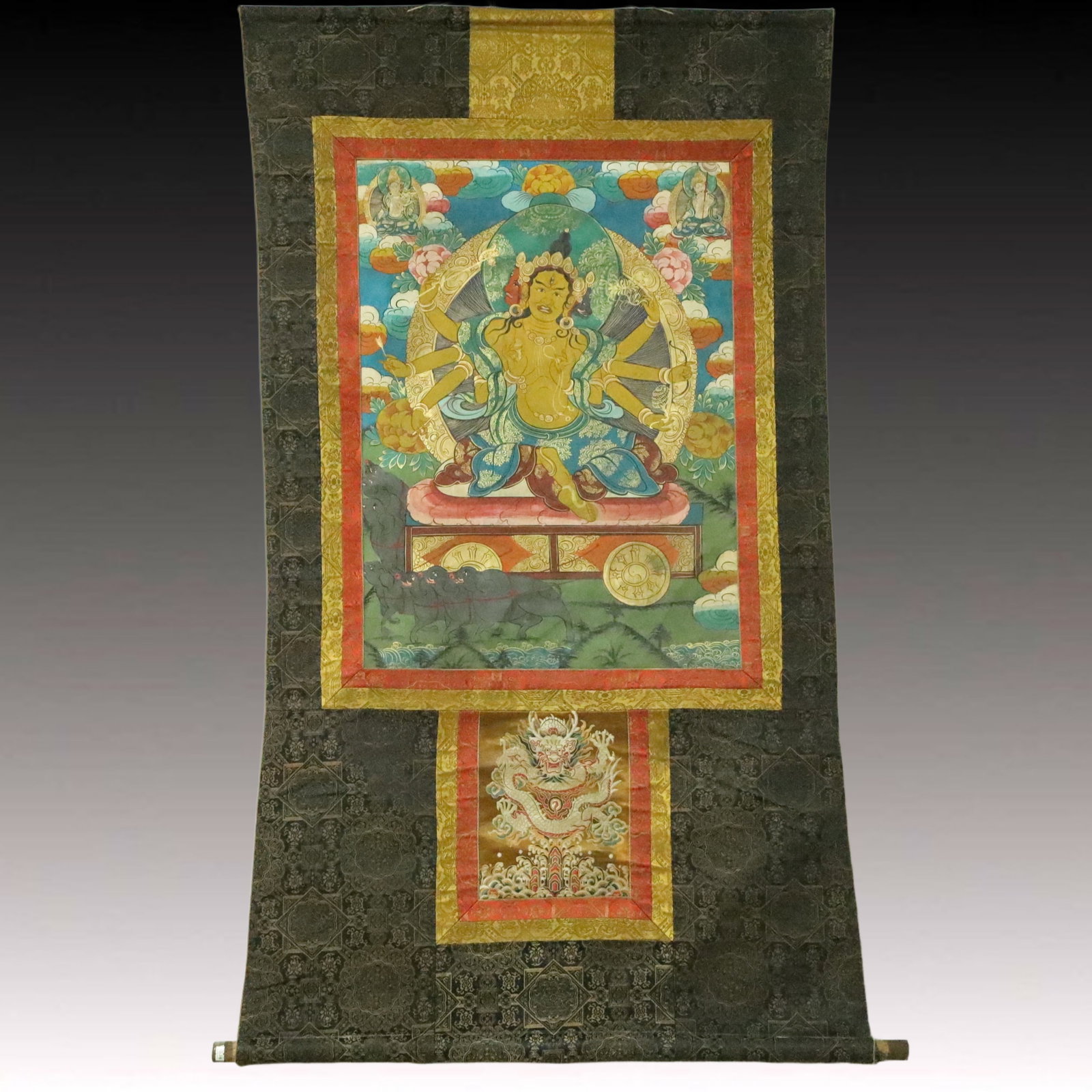 An Exquisite Aquamarine Bracelet: A fine thangka of Marici, the goddess of dawn, painted in mineral colours on woven brocade, the figure seated on a lotus throne with multiple arms holding various attributes. 织锦彩&