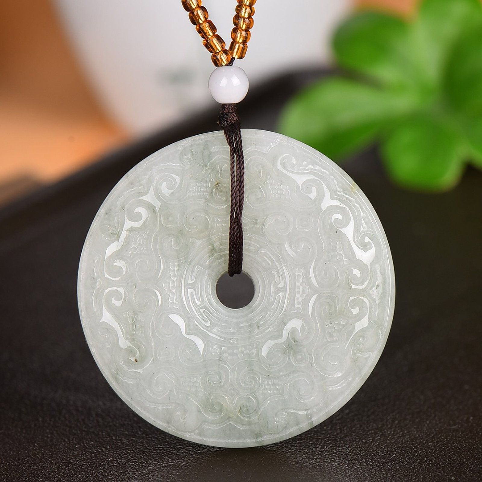 A Chinese Vertical Scroll Ink Painting of Flower and Bird on Silk: An Exquisite Jadeite Auspicious Cloud Pattern Pendant,Size:49mmx49mm 翡翠祥云纹挂件