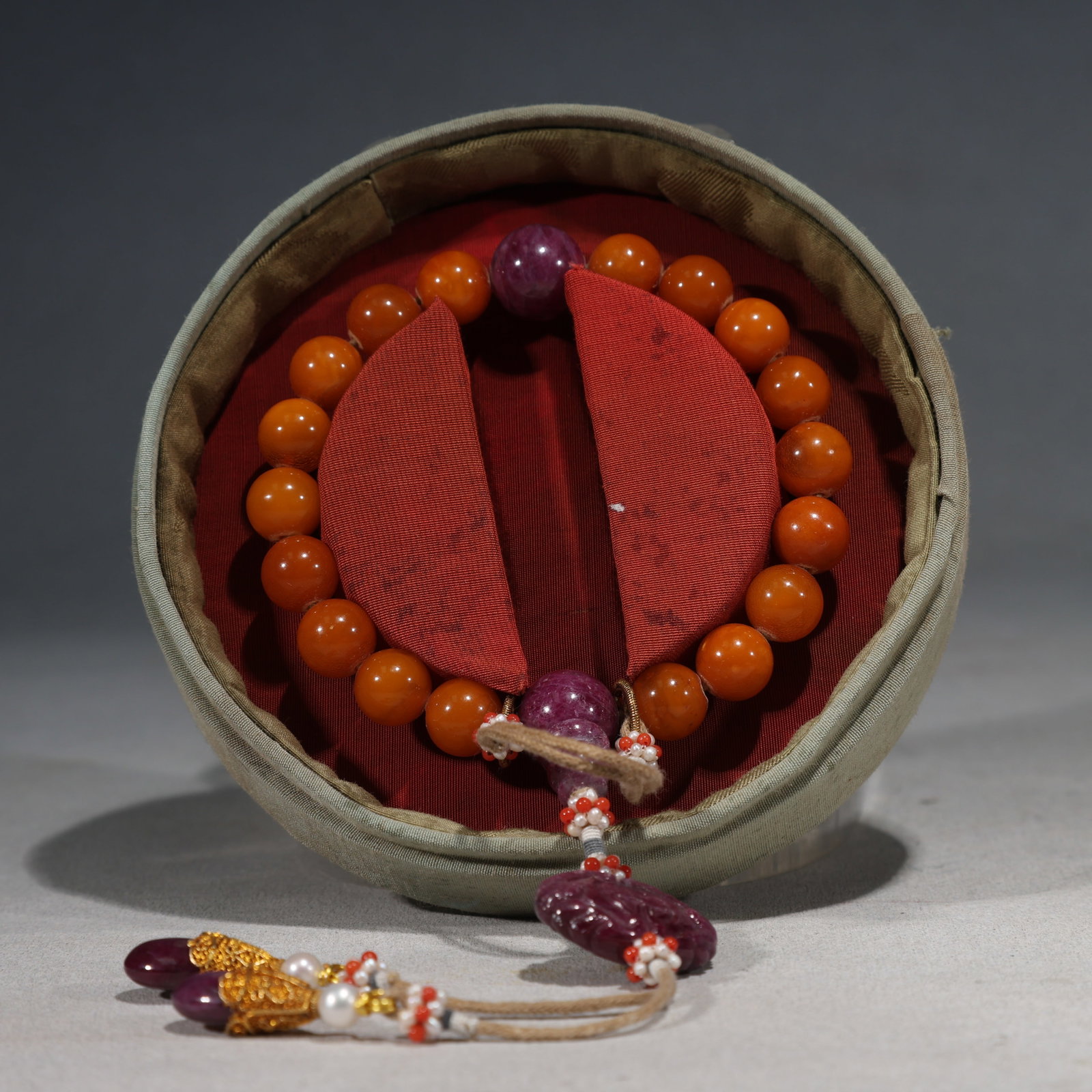 An Exquisite Yellow Ground Famille-Rose Lotus Pattern Double-Ears and Tripod Censer: An Exquisite Beeswax with Natural Tourmaline Bracelets,Qing Dynasty, China,Size:0.4in 精美的蜜蜡配碧玺手串,中国清代
