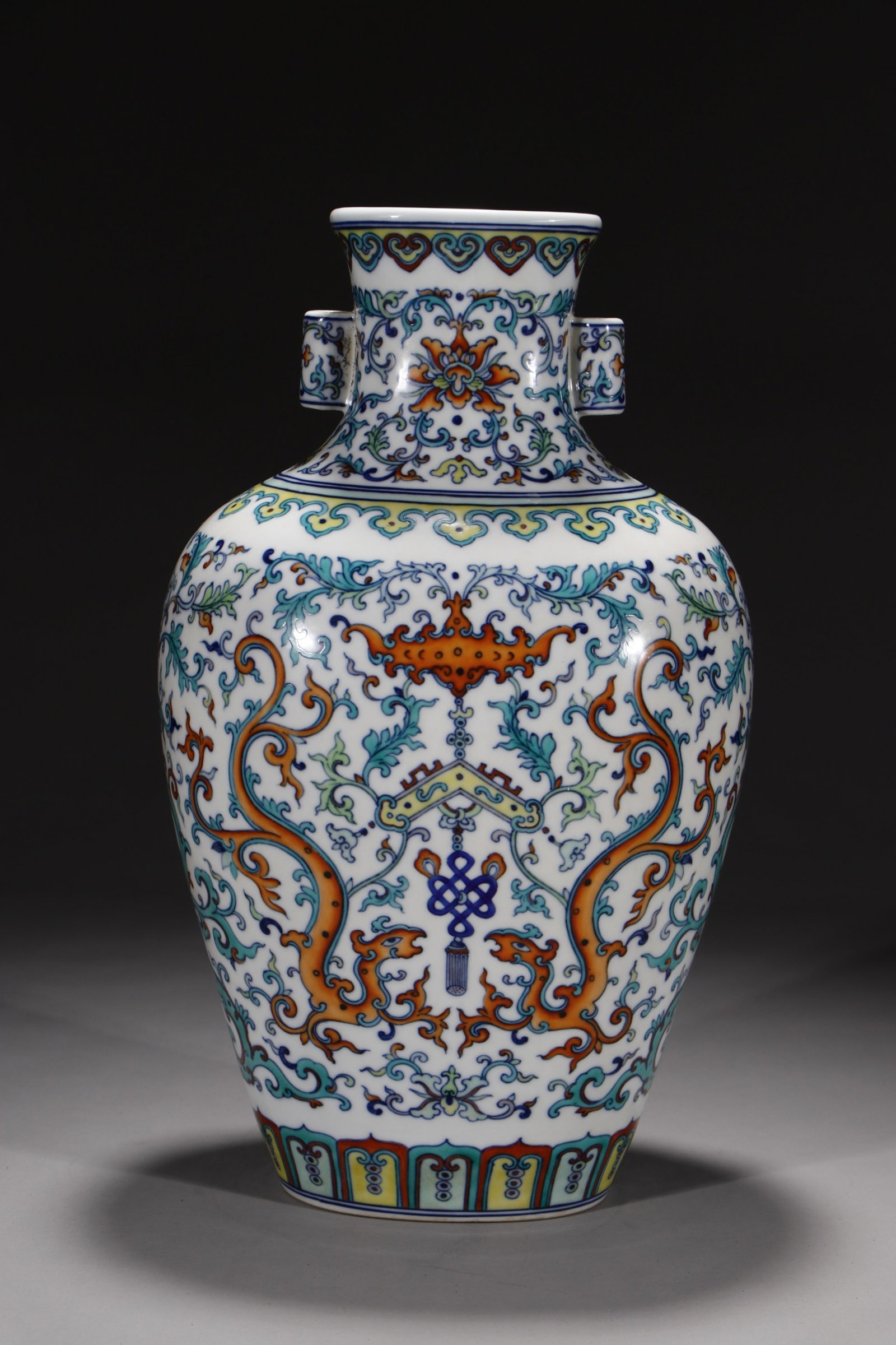 An Exquisite Beeswax Inlaid Silver Necklace: A Rare Doucai Lotus and Dragon Pattern Double-Ears Vase,Qing Dynasty,China,Qianlong Six-character Mark,Size:14.2in 斗彩缠枝莲龙纹双耳瓶,