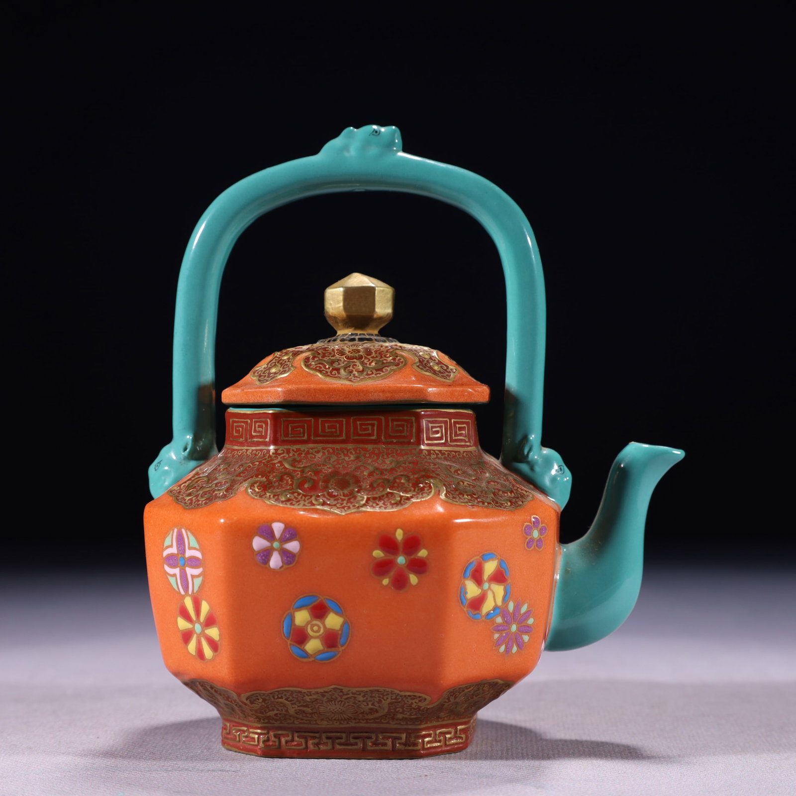 A Rare Bronze Beast-Head Pot,With Inscription: An Exquisite Red Glazed Painted Gold Flower Pattern Teapot,Qing Dynasty,China,Yongzheng Four-character Mark,Size:4.7inx3.5inx5.9in,Weight:400g 红釉描金花卉纹&