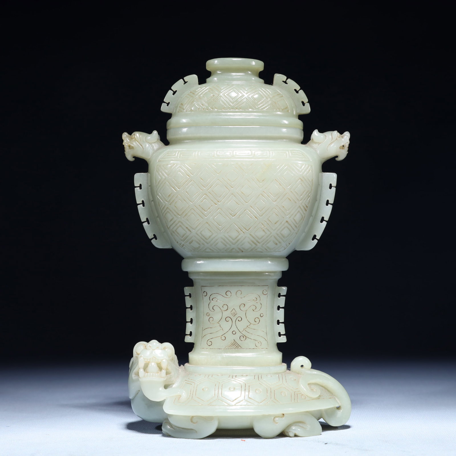 An Exquisite Archaic Jade Phoenix Pendant: An Exquisite White Jade Double-Ears Bottle,Qing Dynasty,China,Size:4.7inx3.1inx8.3in,Weight:900.4g 白玉双耳盖瓶,中国清代