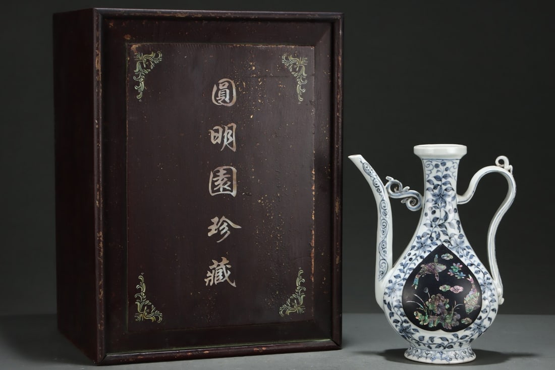 An ExquisiteBlue And White Ewer Inlaid With Mother-Of-Pearl Fish Among Lotus: An ExquisiteBlue And White Ewer Inlaid With Mother-Of-Pearl Fish Among Lotus,Yuan Dynasty, China,Size:9.8inx7.9in 镶嵌螺钿鱼戏莲纹青花ৗ