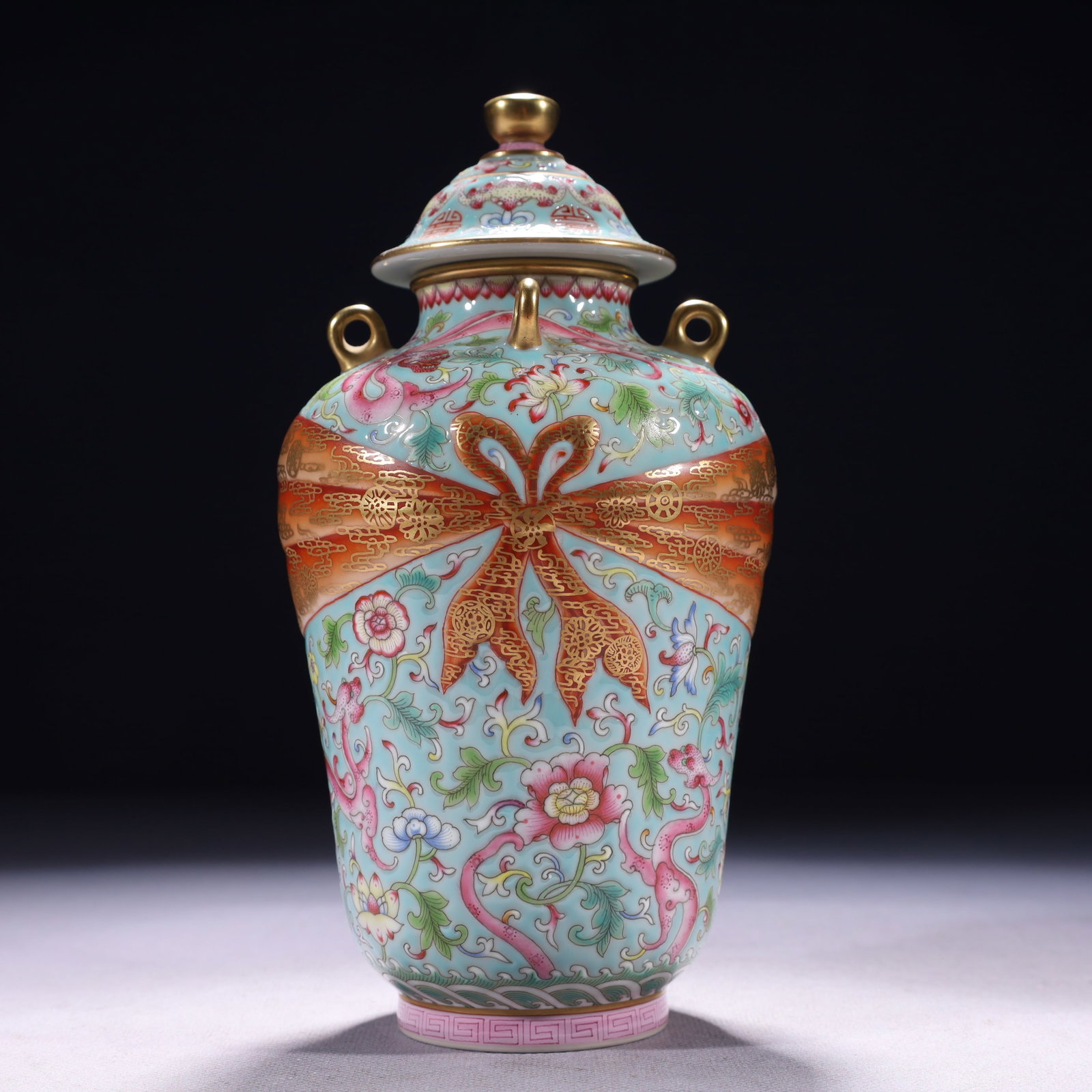 An Exquisite Eaglewood Flower Pattern Cup: An Exquisite Green Ground Enamel Painted Gold Chi-Dragon Pattern Jar with Cover,Qing Dynasty,China,Qianlong Six-character Mark,Size:3.9inx7.9in,Weight:550g 绿地珐琅彩