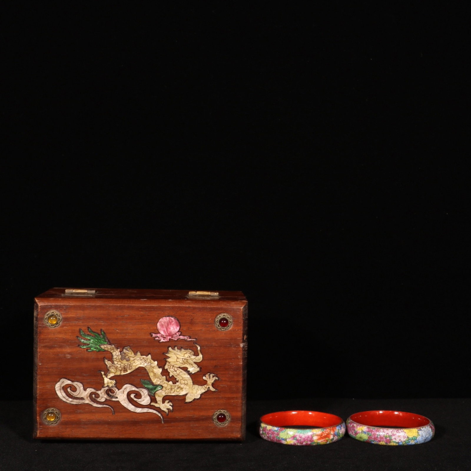 A Pair of Exquisite Enamel Flower Pattern Bracelets: A Pair of Exquisite Enamel Flower Pattern Bracelets,Qing Dynasty,China,Qianlong Four-character Mark,Size:0.6inx3.3in 一对珐琅彩花卉纹手镯,&#