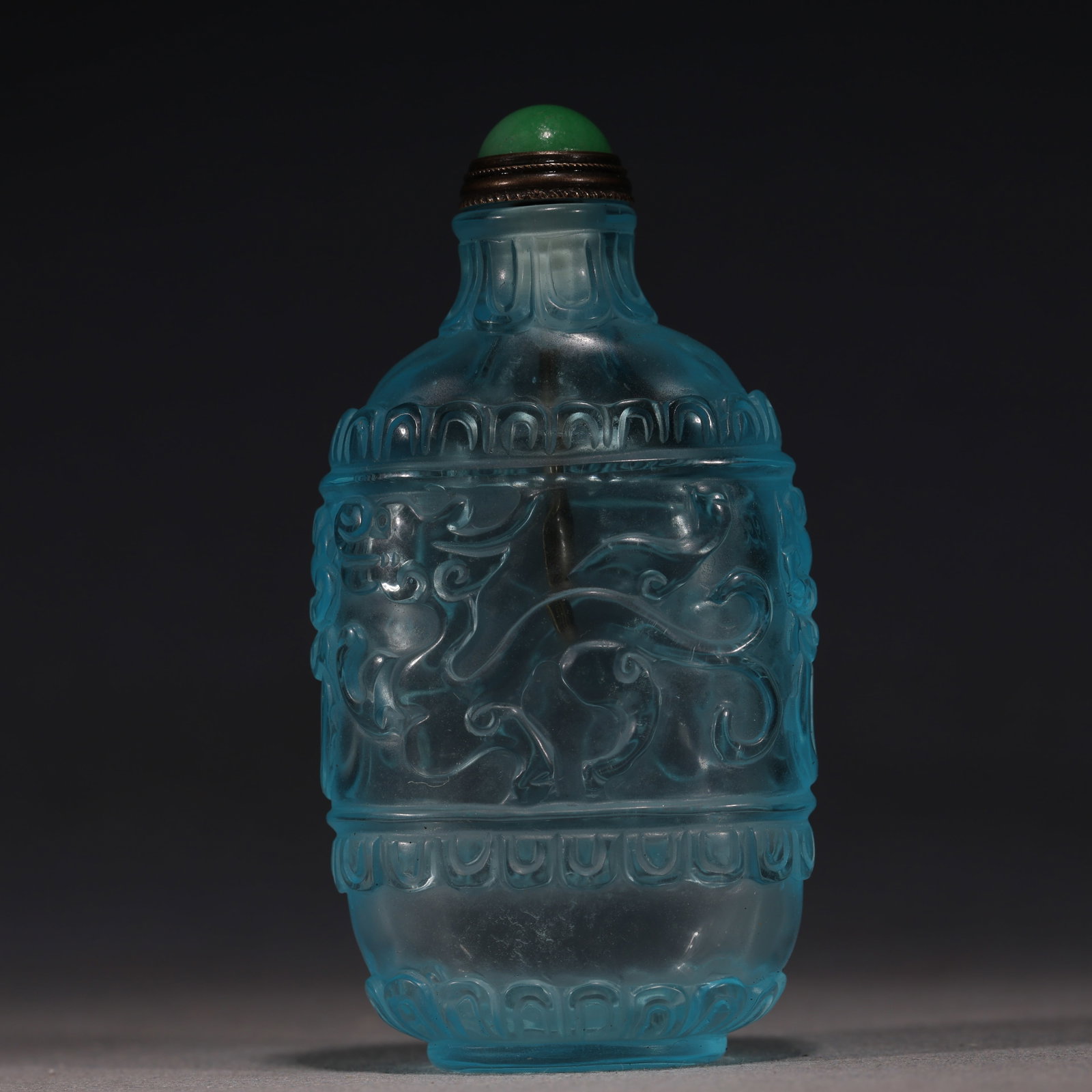 An Exquisite Enamel Western Figure Pattern Double-handled Snuff Bottle: An Exquisite Sky-blue Glass Relief Chilong Dragon Lotus Petal Pattern Snuff Bottle,Qing Dynasty, China,Qianlong Four-character Mark,Size:1.8in×1in×3.3in 天蓝琉璃Ę