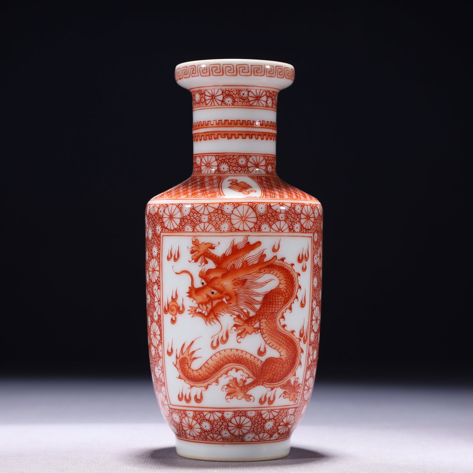 An Exquisite Jasper Bracelets: An Exquisite Iron-Red Auspicious Cloud and Dragon Pattern Vase,Qing Dynasty,China,Qianlong Six-character Mark,Size:3.1inx6.5in,Weight:250g 矾红祥云龙纹瓶,