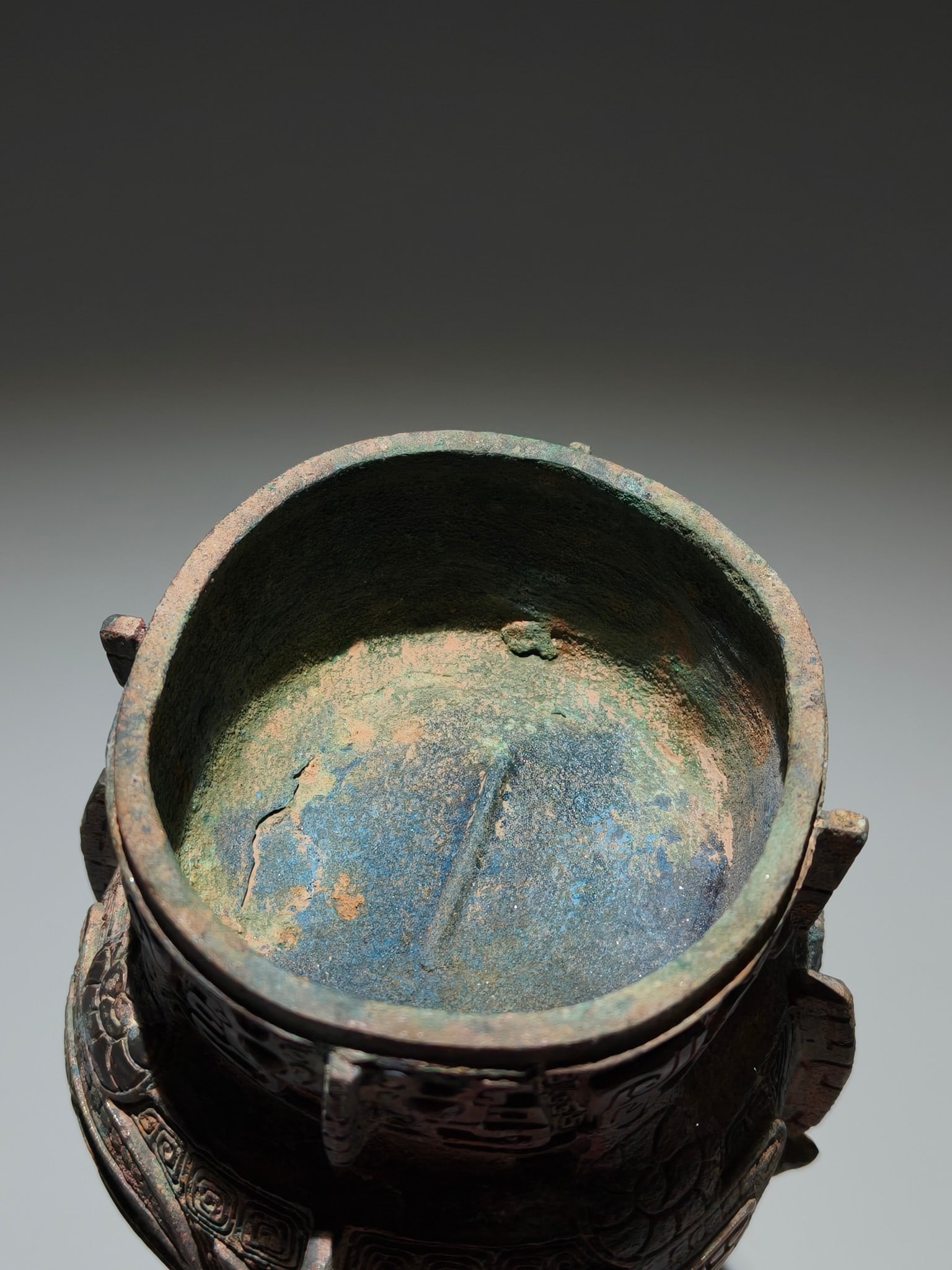 An Archaic Bronze Beast-Face Pattern Libation Cup - 9
