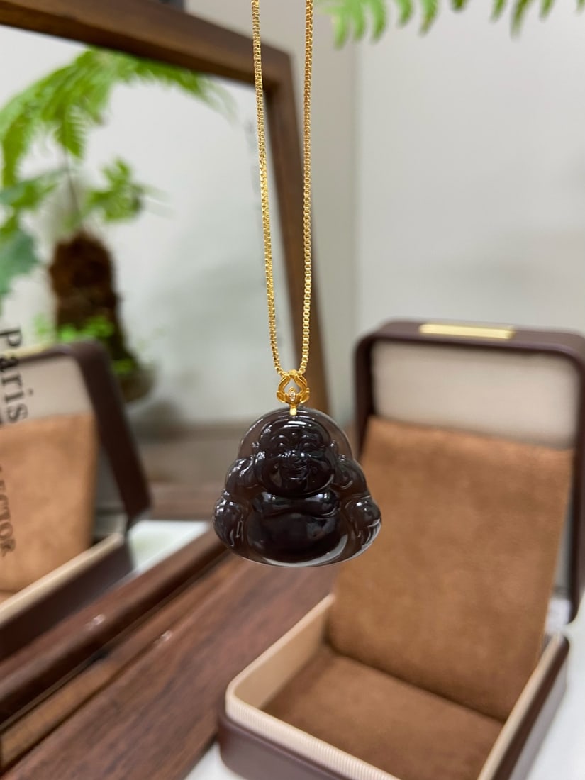 An Exquisite Blue Ground Famille-Rose Auspicious Cloud and Dragon Pattern Vase: A finely carved Hetian jade pendant of 'imperial purple' (yanzi) tone, set in 18K gold, carved as a seated Maitreya Buddha. The jade is of rich, luminous purple hue with a fine, warm texture. The pend