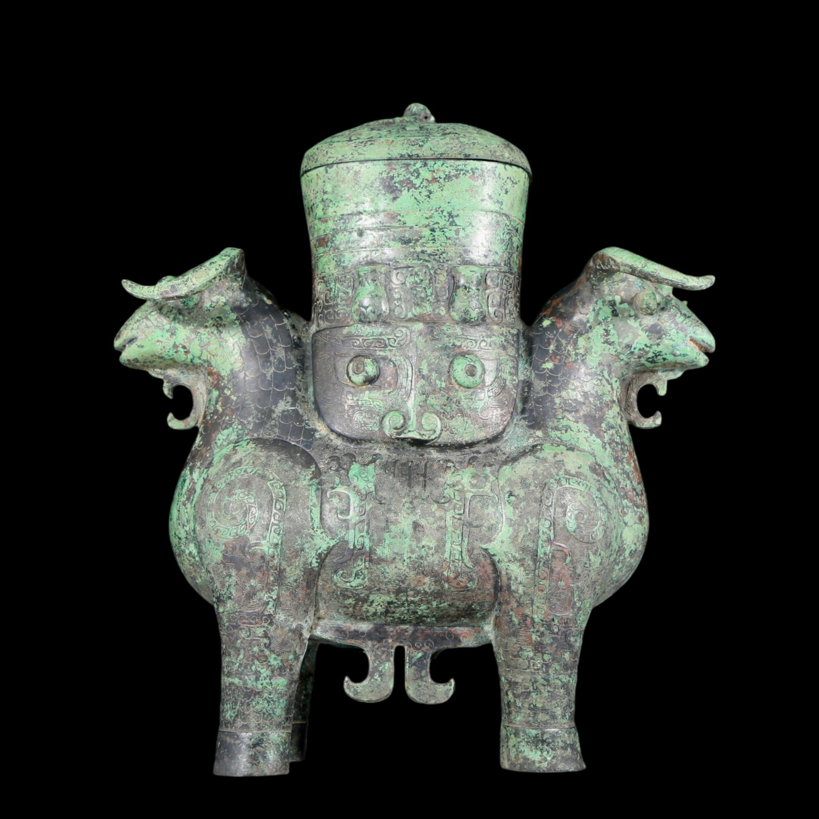 A Pair of Exquisite Famille-Rose Character and Story Pattern Stem Cups: A precious bronze lamb's ear bottle with lid and inscription. In ancient times, the surface was carefully carved, vividly demonstrating the superb skills of the craftsman. It has its own unique