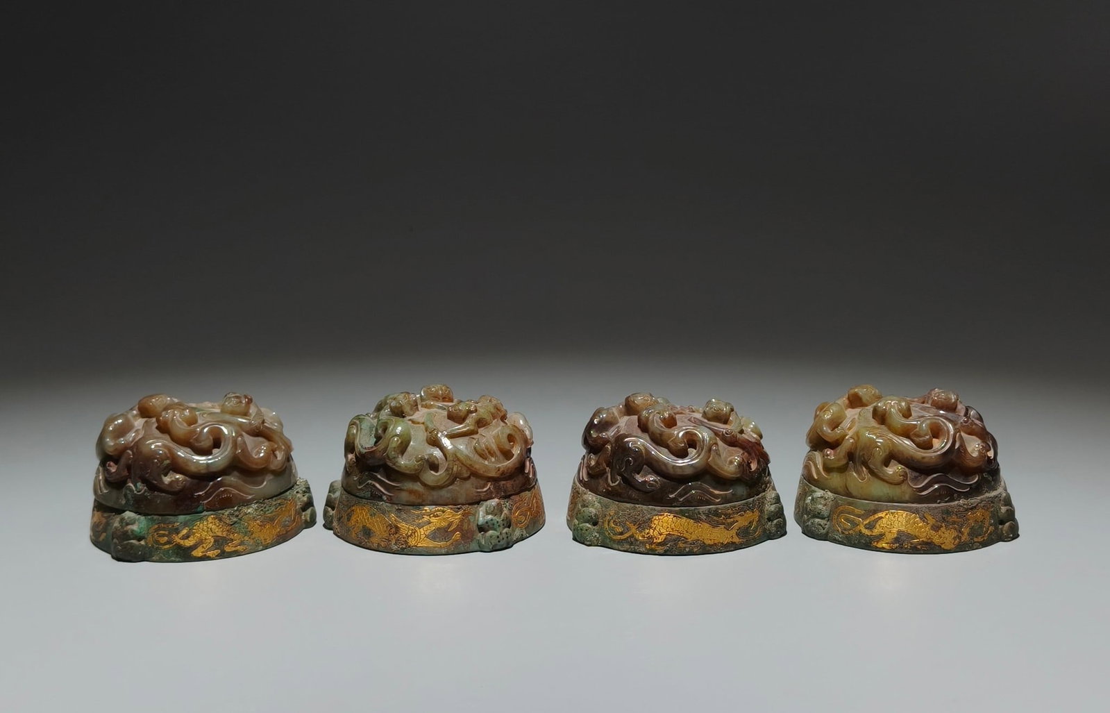 An Exquisite Sterling Silver-Gold Plated Inlaid White Jade Enamel Bracelets: A Set of Archaic Bronze Inlaid White Jade Inlaid Gold and Silver Chi-Dragon Pattern Ornaments,the Warring States period in China,Size:2inx3in 一套