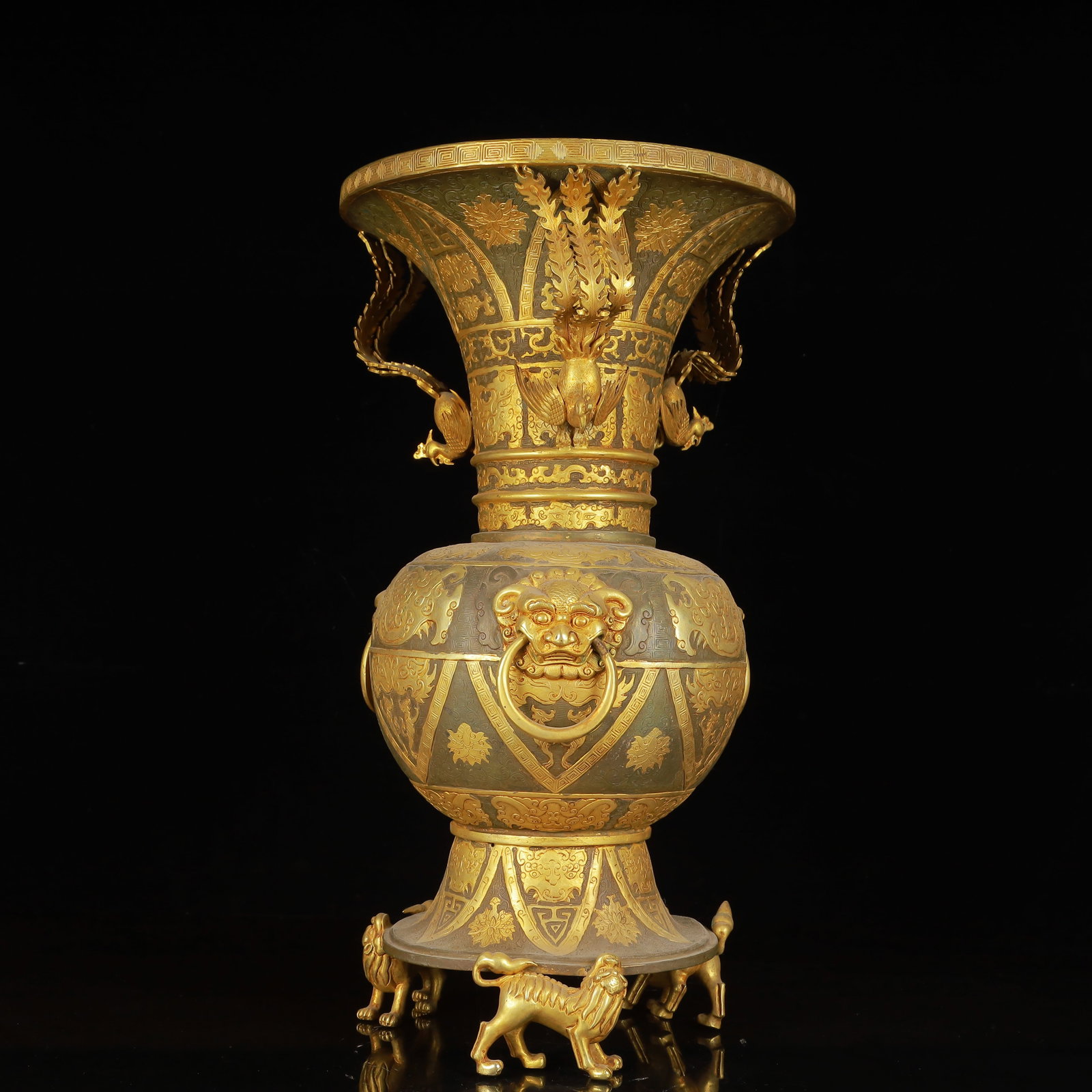 An Exquisite Archaic Jade Beast-Face Pattern Tripod Cup: An Exquisite Gilt Silver Dragon and Phoenix Pattern Beast-Ears Beast Legs Vase,Tang Dynasty,China,Zhenguan Four-Character Mark,Size:16.5inx9.1in,Weight:4950g 银鎏金龙凤&#