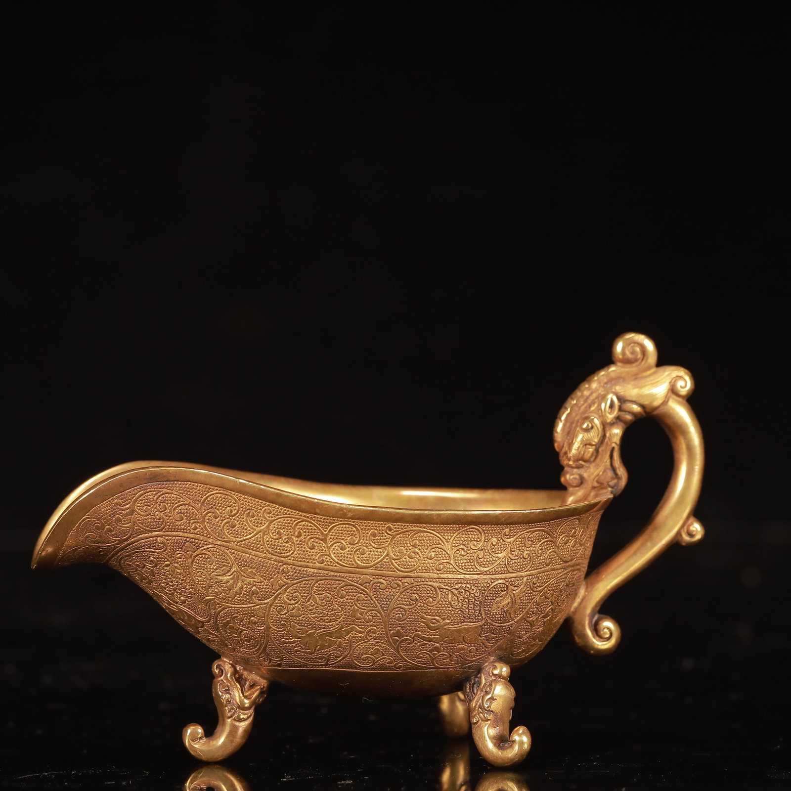 An Exquisite Gilt Bronze Grapes and Deer Pattern Libation Cup: An Exquisite Gilt Bronze Grapes and Deer Pattern Libation Cup,Qing Dynasty, China,Size:4.7inx2.8inx3.1in,Weight:200g 铜鎏金葡萄鹿纹酒杯,中&#