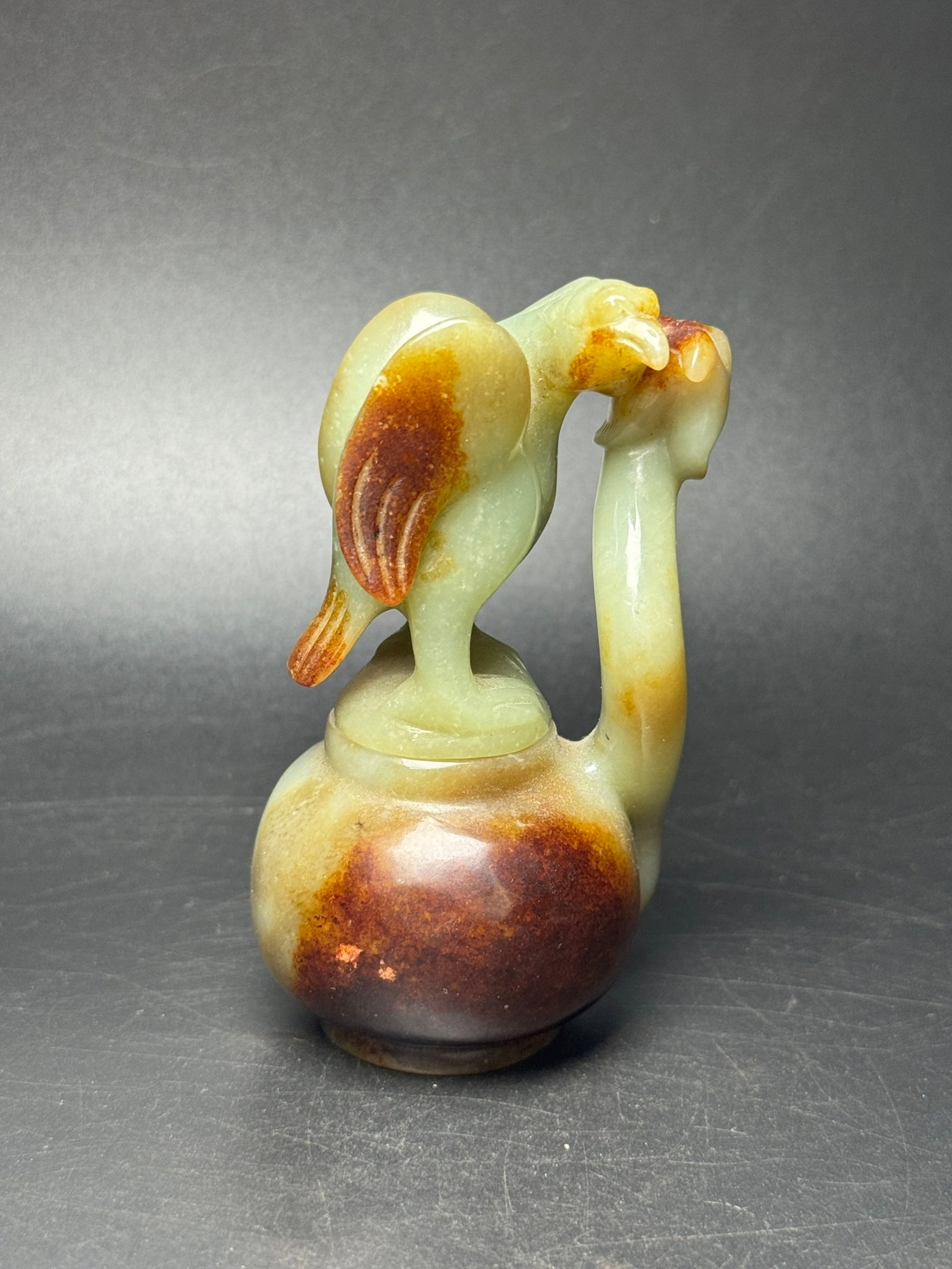 An Exquisite Yellow Jade Phoenix Ornament: An Exquisite Yellow Jade Phoenix Ornament,Qing Dynasty,China,Size:2inx1.8inx3.5in,Weight:134g 黄玉凤摆件,中国清代