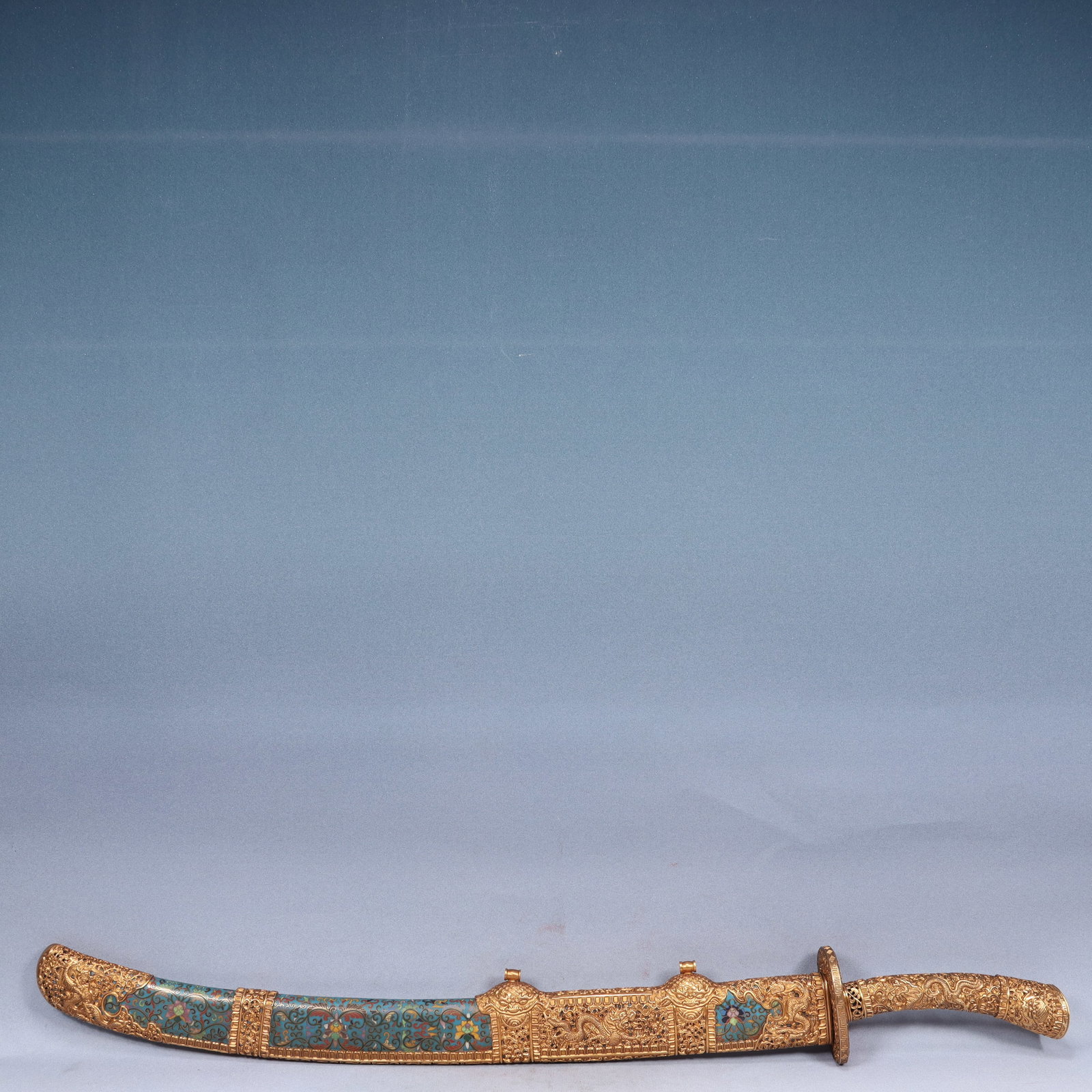 A Huge Cloisonne Lotus and Dragon Pattern Sword: A Huge Cloisonne Lotus and Dragon Pattern Sword,Qing Dynasty, China,Qianlong Six-character Mark,Size:3.5inx4.7inx41.3in,Weight:3700g 景泰蓝缠枝莲龙纹