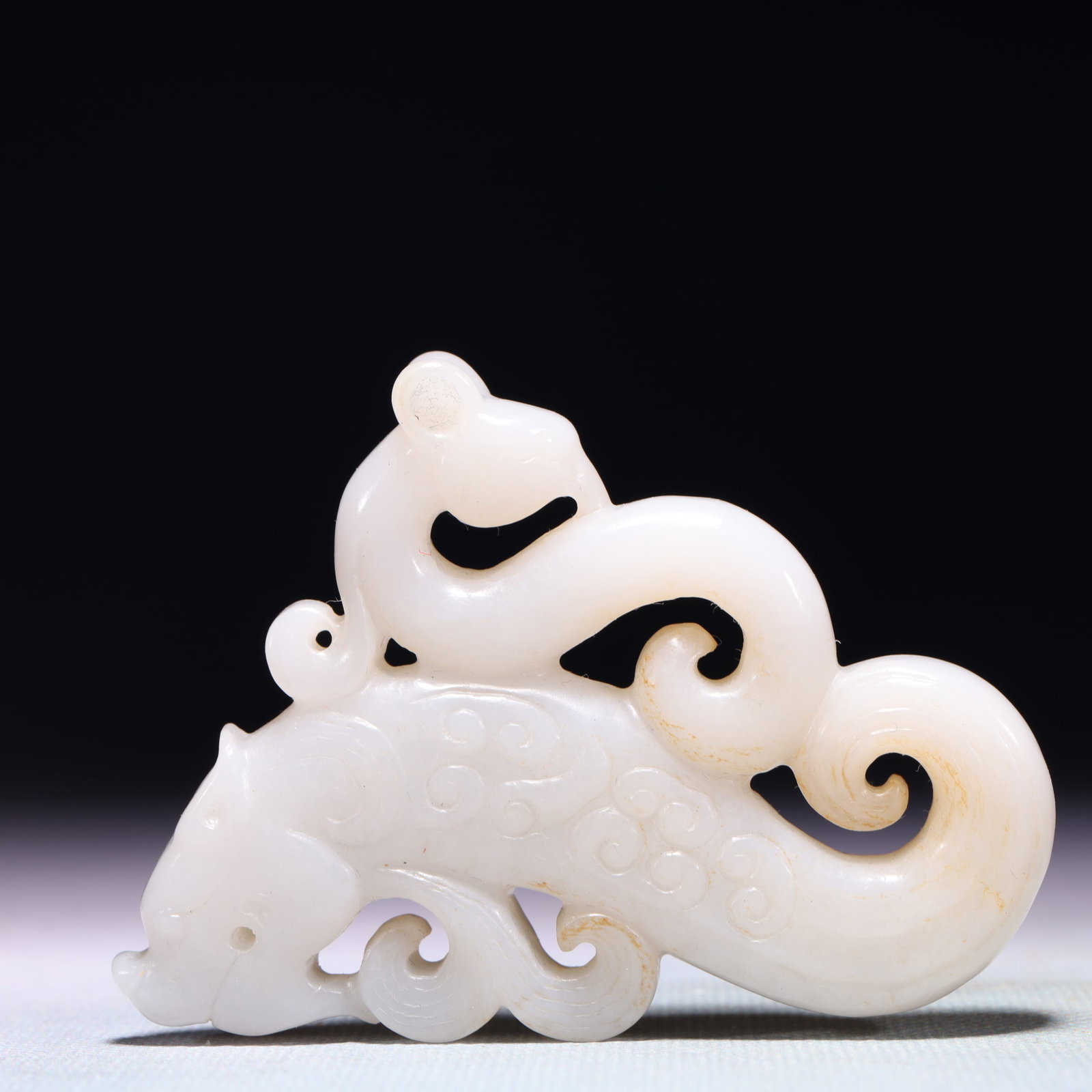An Exquisite White Jade Dragon and Phoenix Ornament