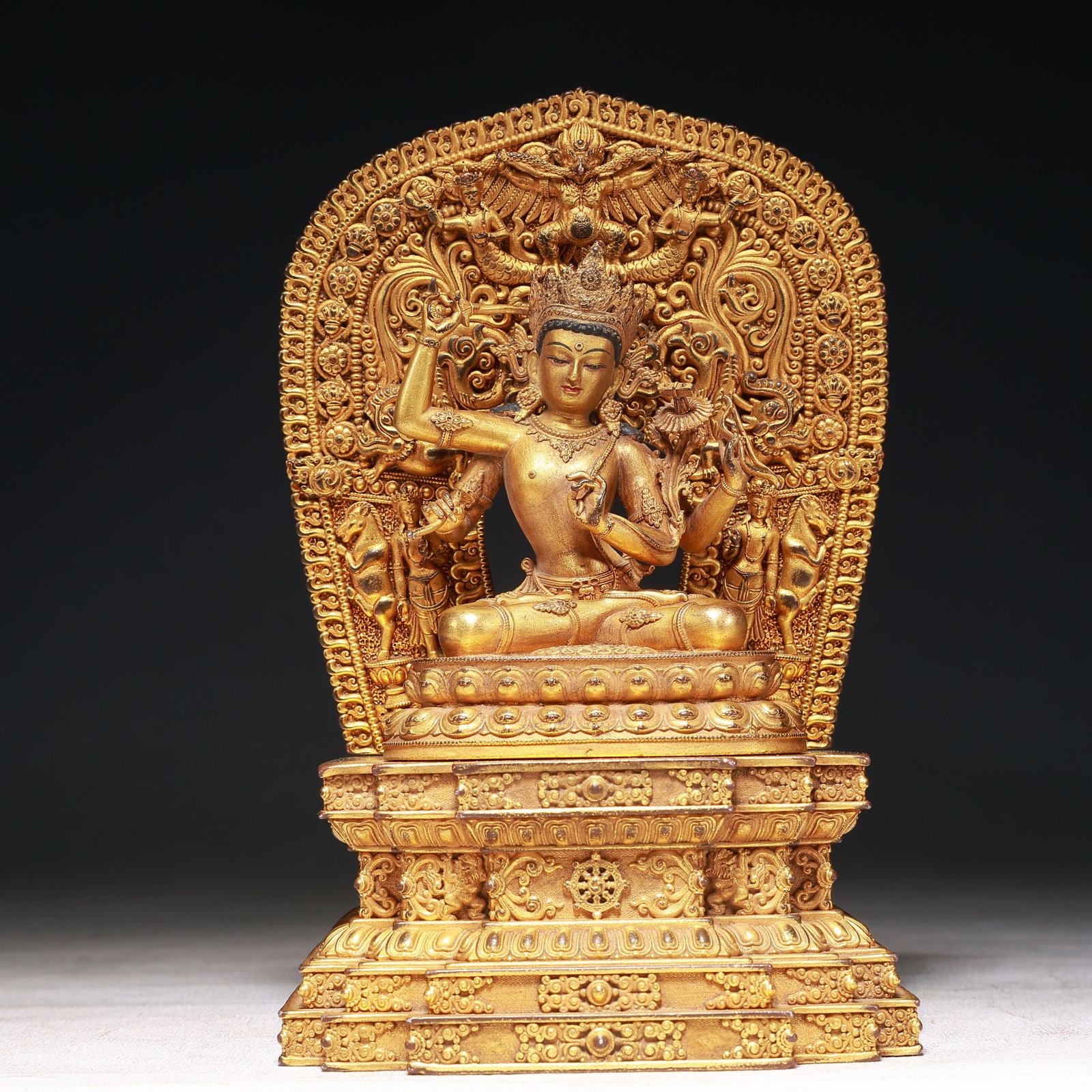 A Solemn Gilt Bronze Statue of Manjusri,With Inscription: A Solemn Gilt Bronze Statue of Manjusri,With Inscription,Qing Dynasty,China,Size:4.3inx3.1inx7.5in,Weight:1150g 铜鎏金文殊菩萨像,带铭文