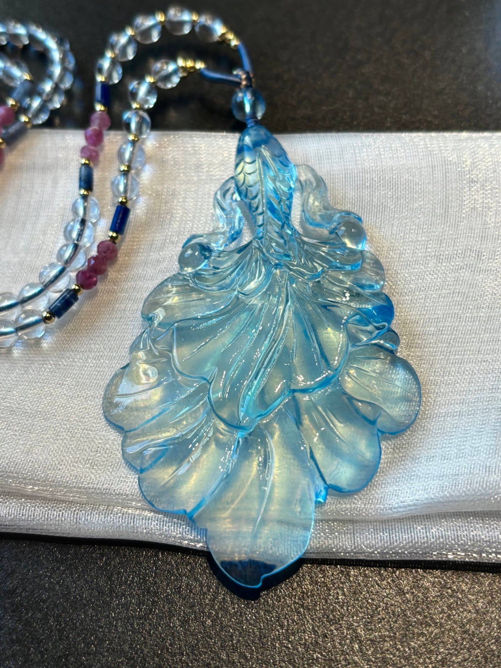 An Exquisite Aquamarine Fish Pattern Pendant: An Exquisite Aquamarine Fish Pattern Pendant,Size:2.6inx1.7inx0.4in,Weight:35.5g 海蓝宝鱼纹挂件