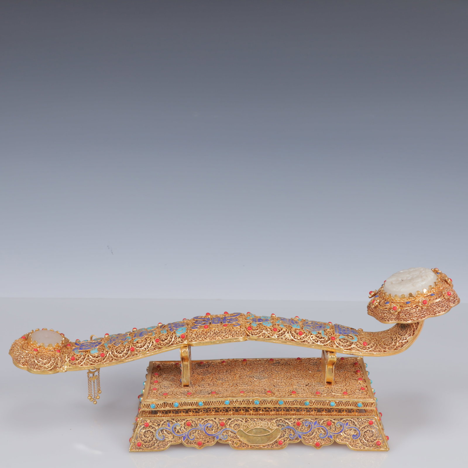 An Exquisite Filigree and Gilding Inlaid White Jade Flower Pattern Ruyi Ornament,Inlaid Gems: An Exquisite Filigree and Gilding Inlaid White Jade Flower Pattern Ruyi Ornament,Inlaid Gems,Qing Dynasty, China,Qianlong Four-Character Mark,Size:16.9inx4.7inx5.5in,Weight:1150g 花丝Ź